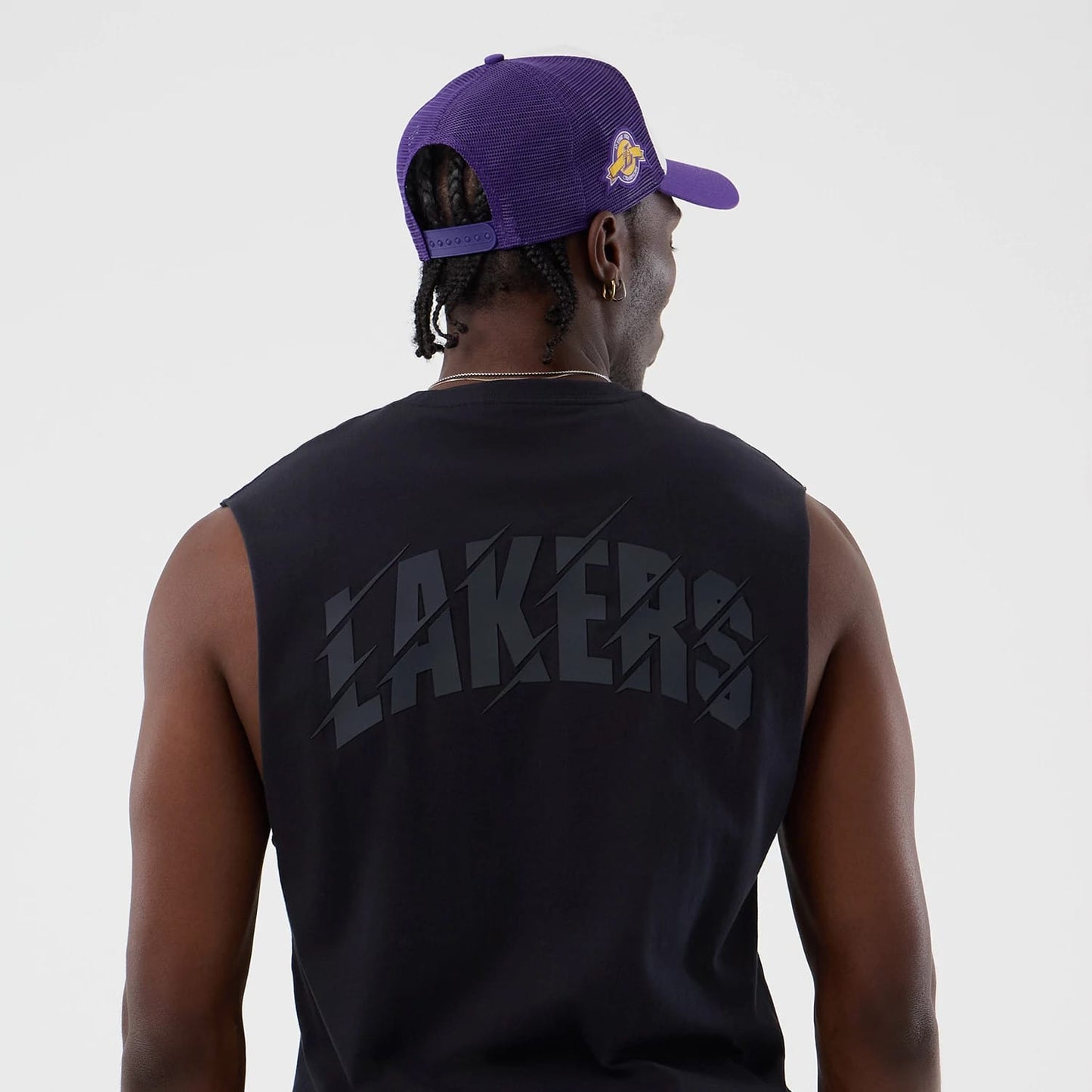 The model is wearing this NBA Core Plus LA Lakers Vest in navy. 7