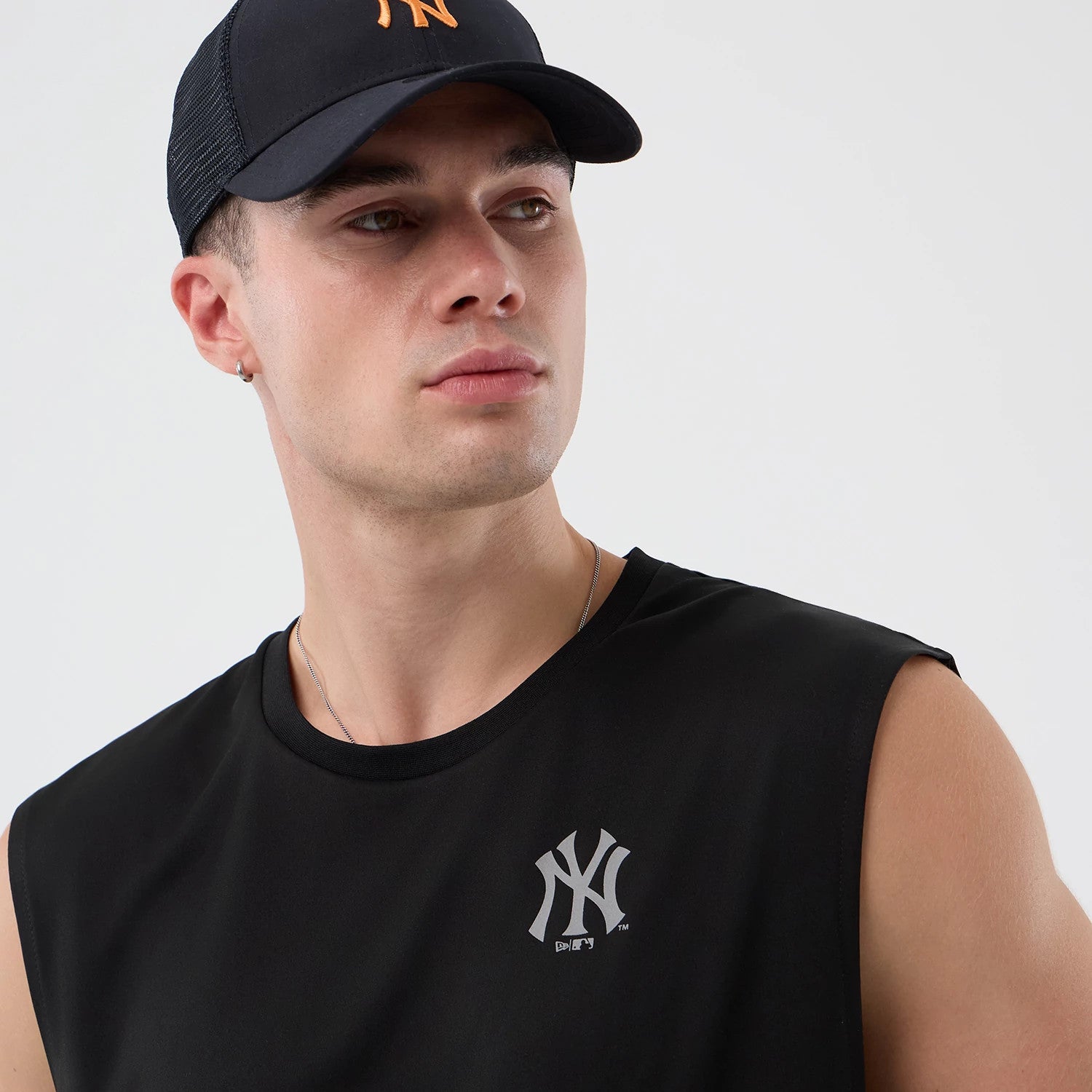 The model is wearing this MLB Core Plus New York Yankees Vest in black. 4