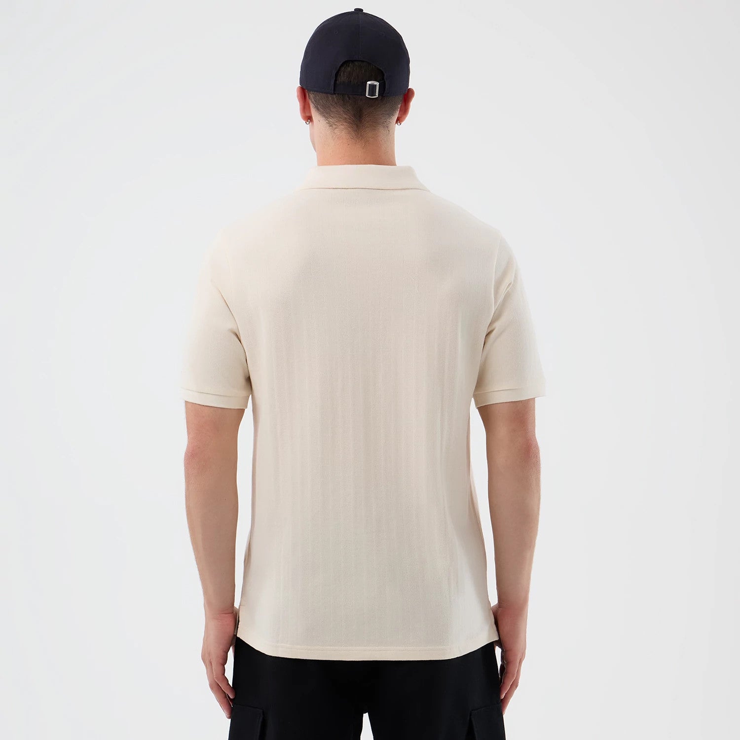 The model is wearing this MLB Rib LA Dodgers Polo T-Shirt in open white. 2