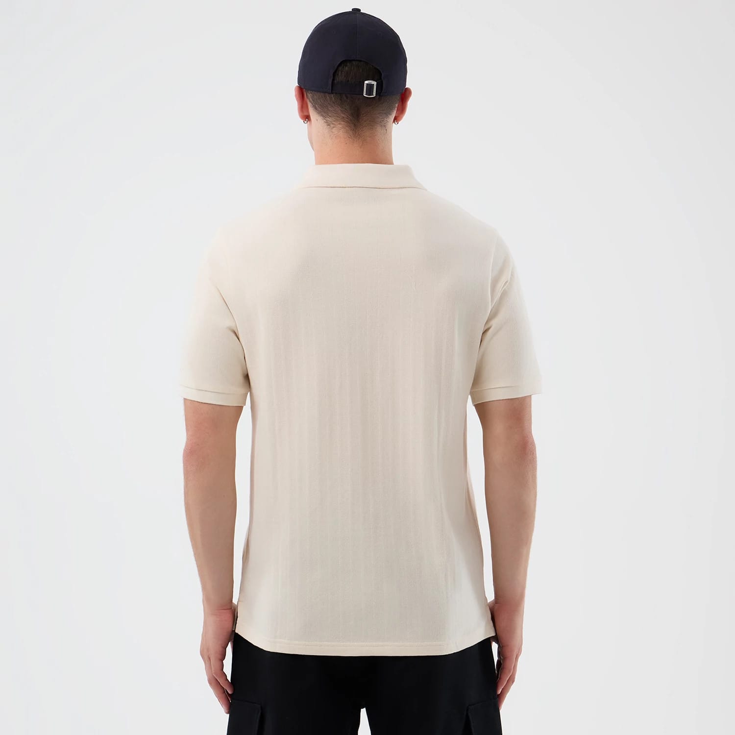 The model is wearing this MLB Rib LA Dodgers Polo T-Shirt in open white. 2