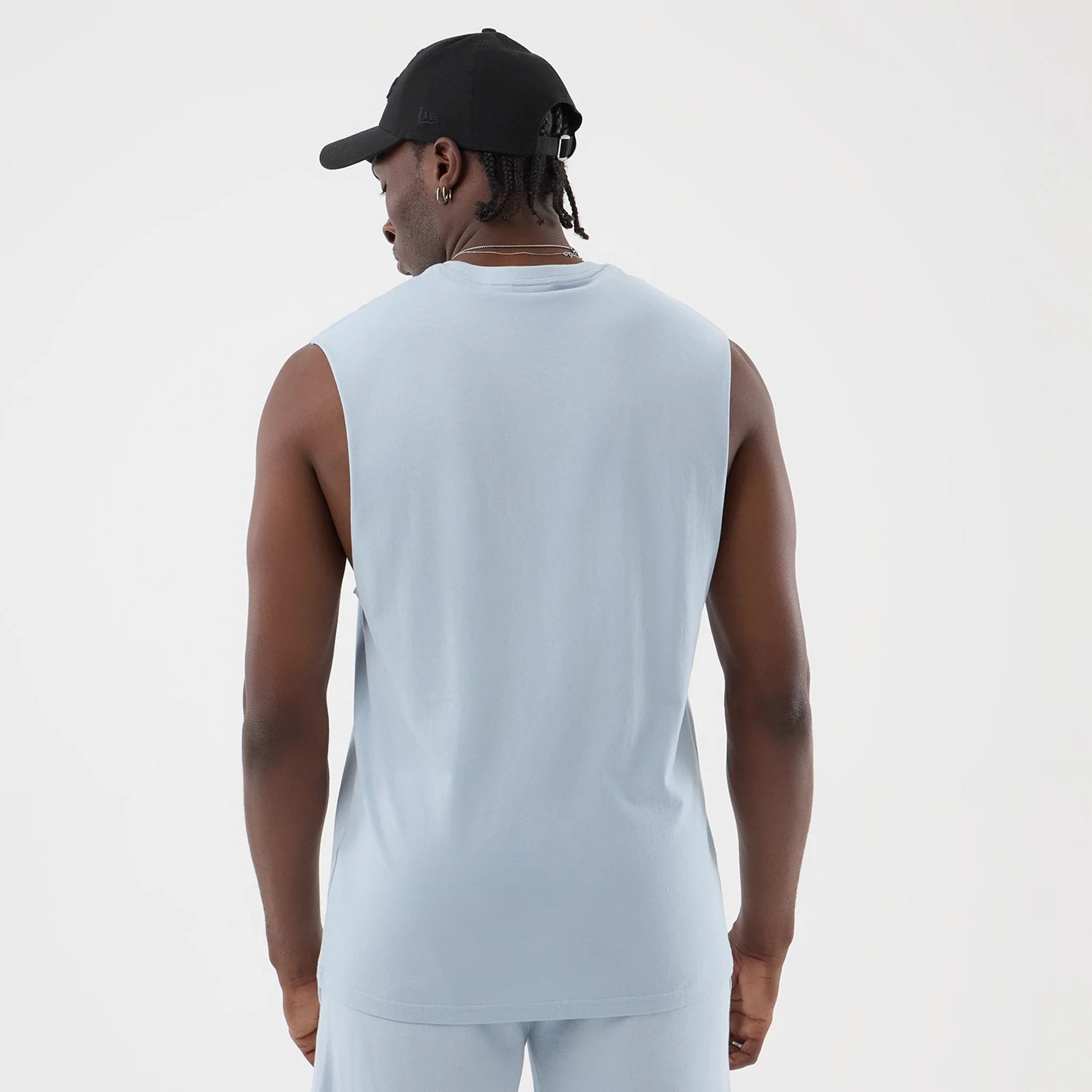 The model is wearing this NBA League Essential LA Lakers Vest in pastel blue. 2