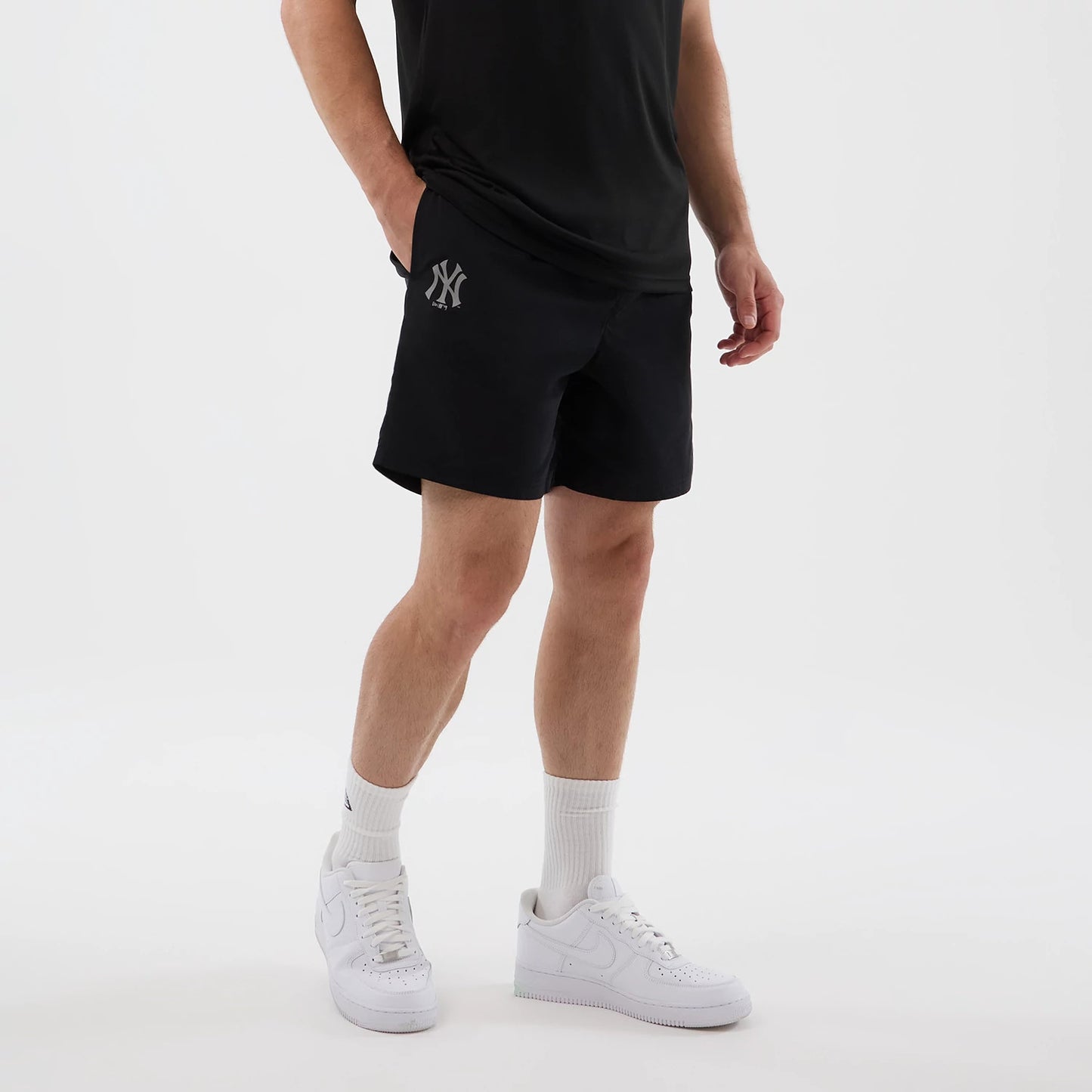 The model is wearing this MLB Core Plus New York Yankees Shorts in black. 7