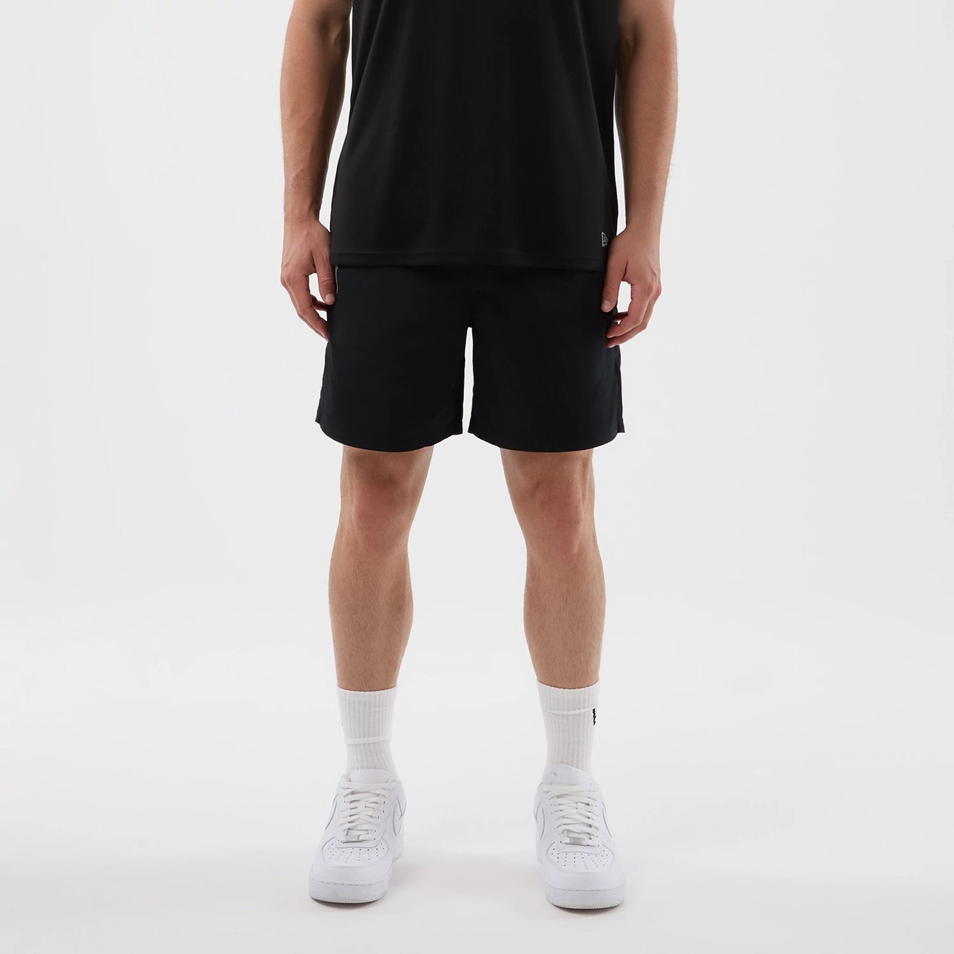 The model is wearing this MLB Core Plus New York Yankees Shorts in black. 1