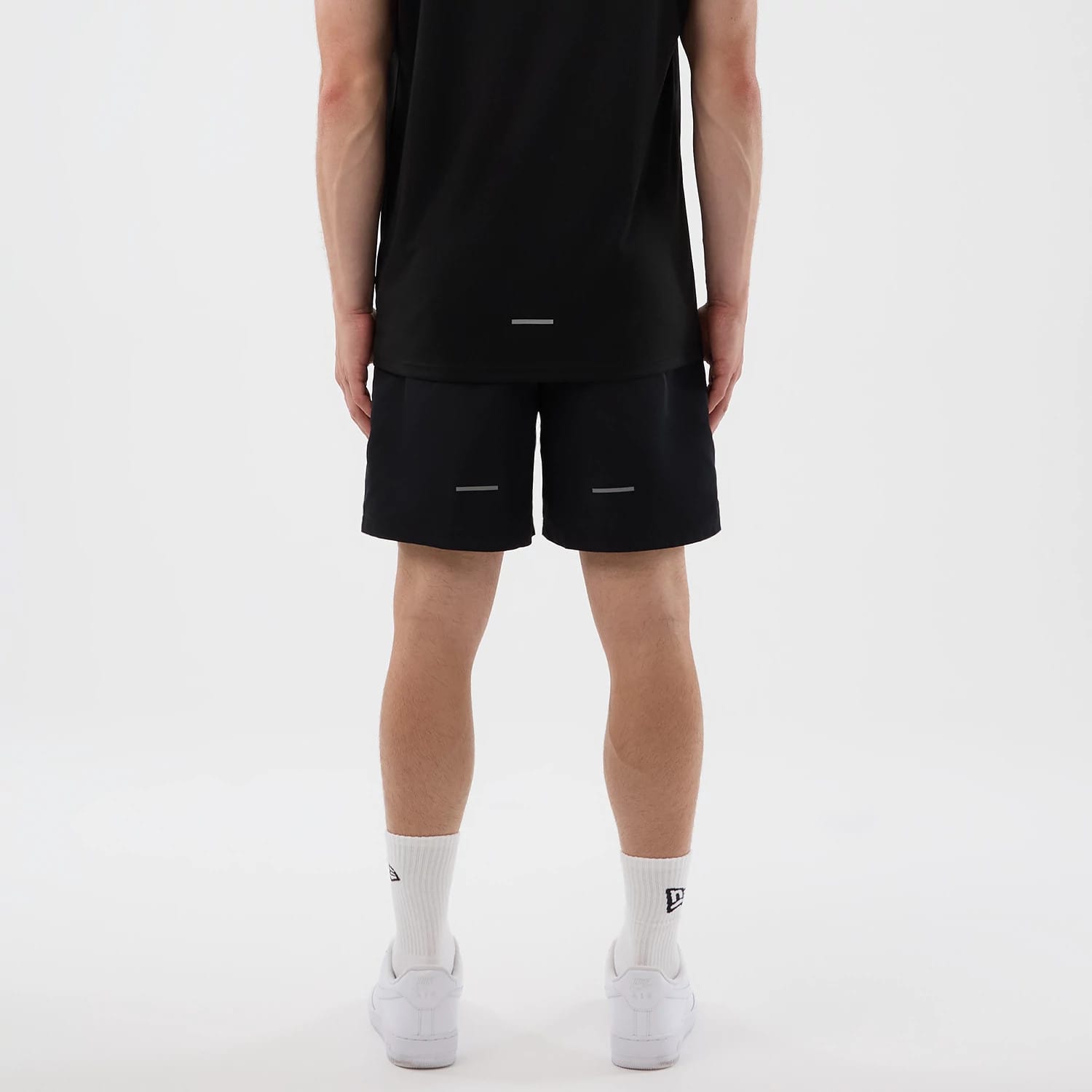 The model is wearing this MLB Core Plus New York Yankees Shorts in black. 2