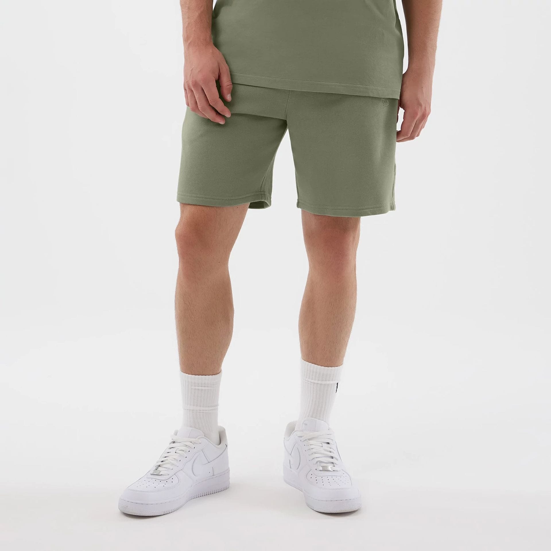 The model is wearing this NBA League Essential Chicago Bulls Shorts in pastel green. 1