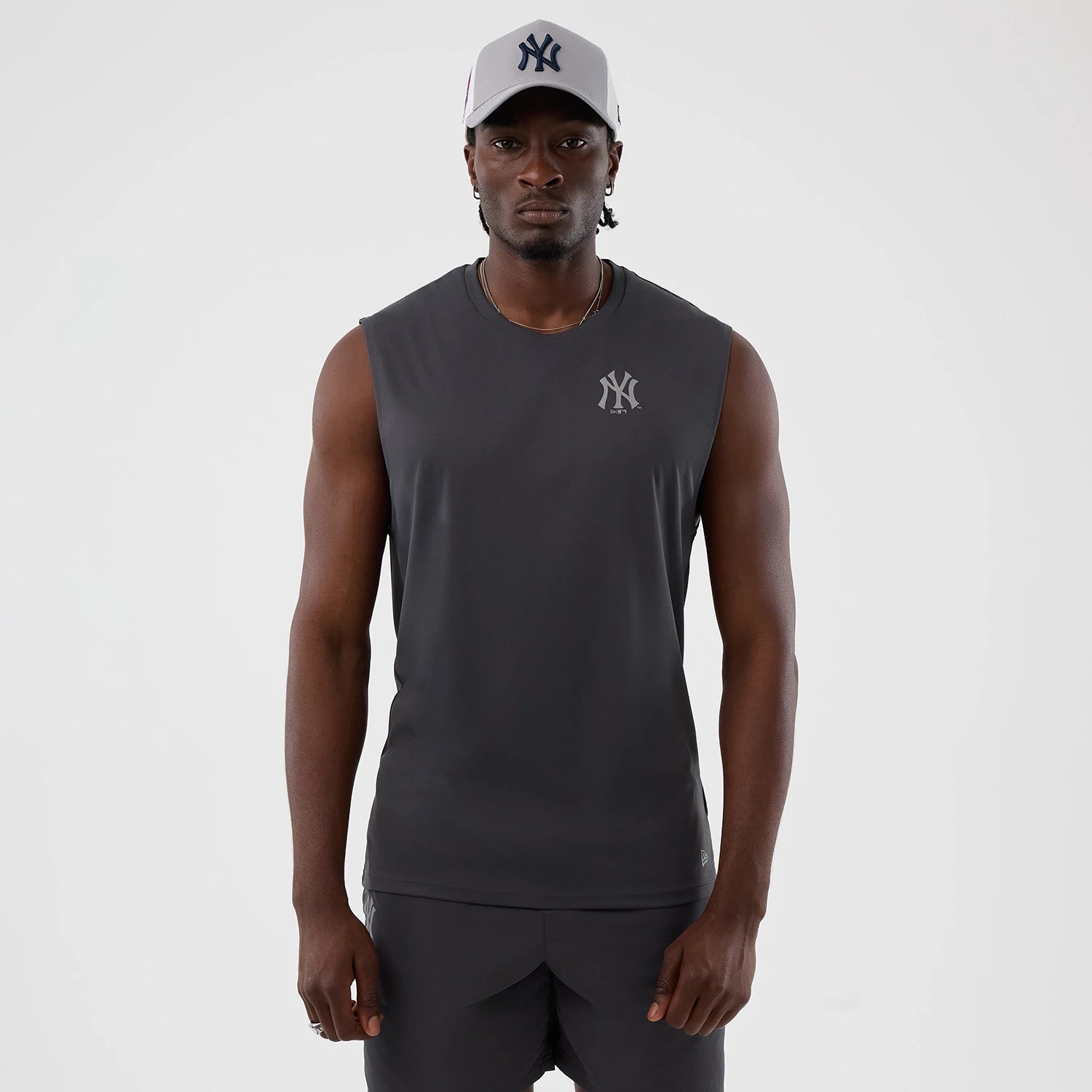 The model is wearing this MLB Core Plus New York Yankees Vest in dark grey. 1