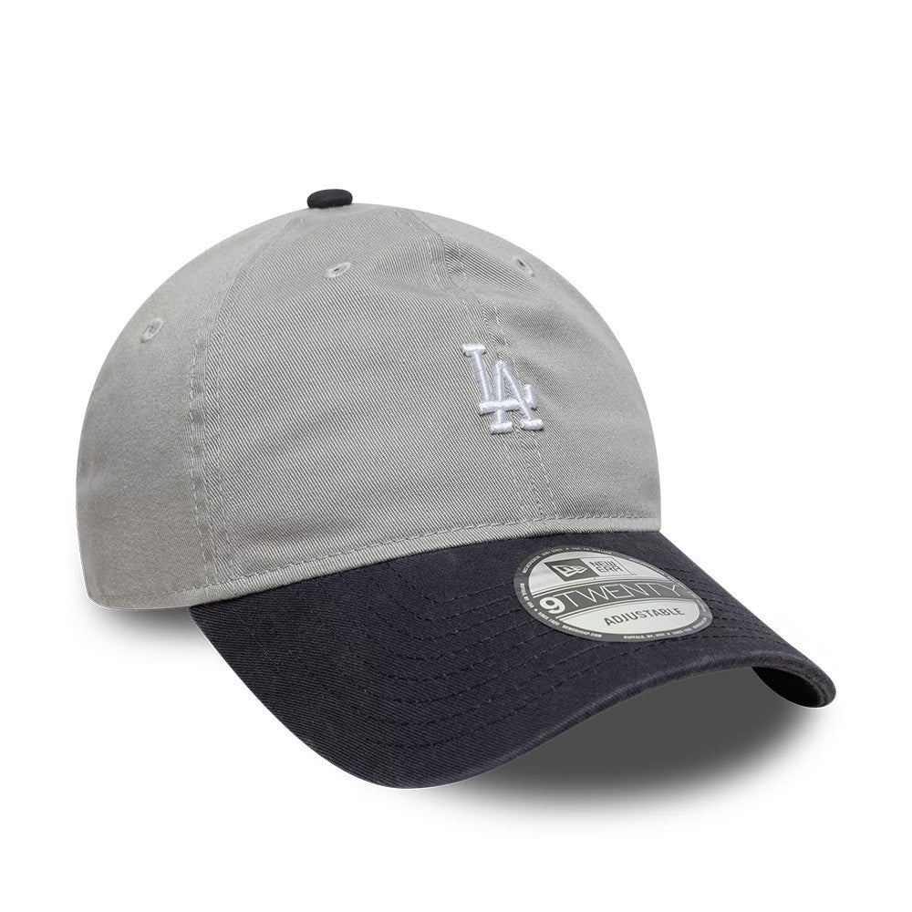 LA Dodgers MLB Washed Contrast Grey New Era 9TWENTY Adjustable Cap, three-quarter view showing the white raised LA embroidered logo on the front panel, a contrasting black curved visor, and a silver 9TWENTY size sticker on top.