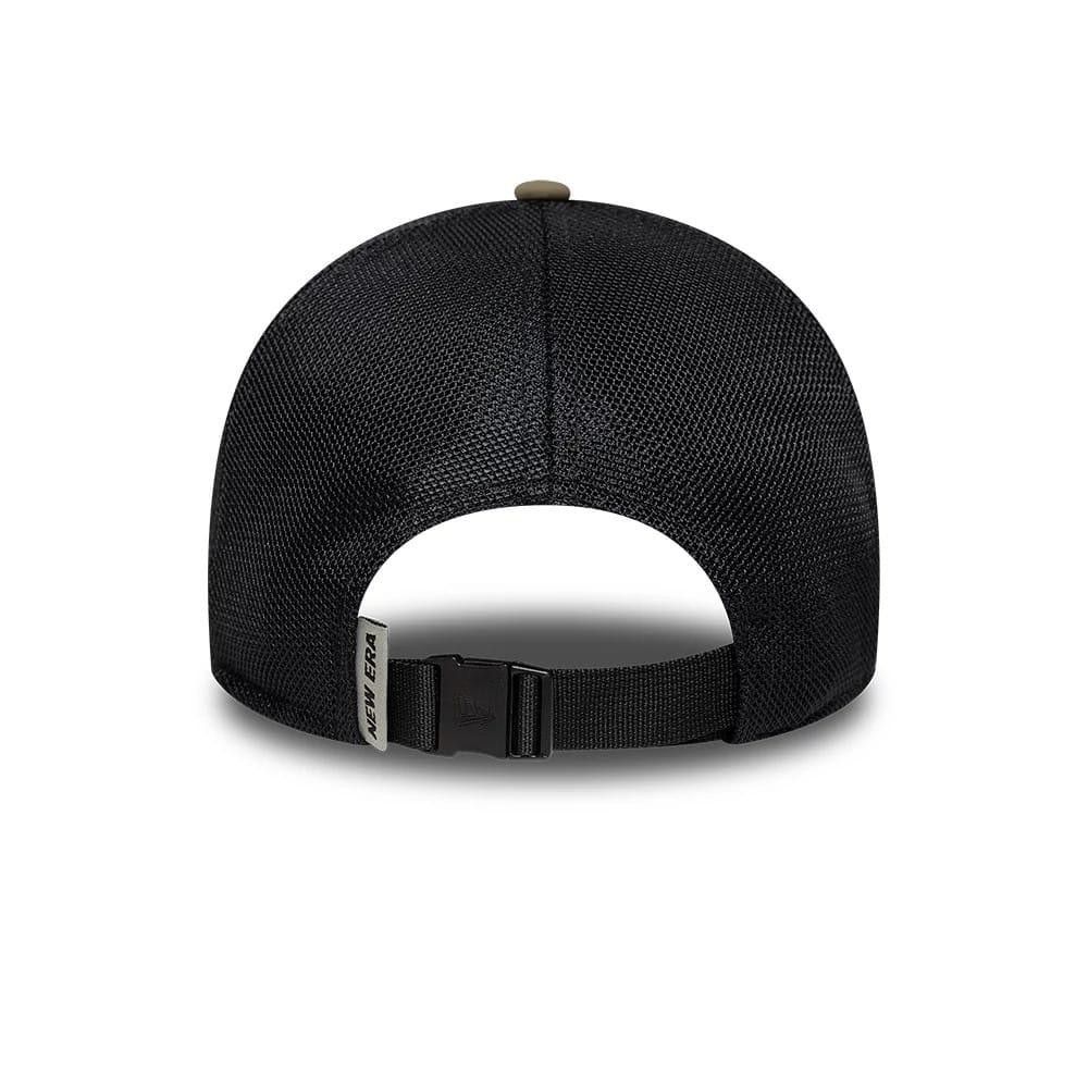 New Era Performance Green 9FORTY M-Crown A-Frame Trucker Adjustable Cap, rear view showing the black mesh back panels with an opening, a black adjustable strap with a clip at the centre, and a New Era tag on the left side.