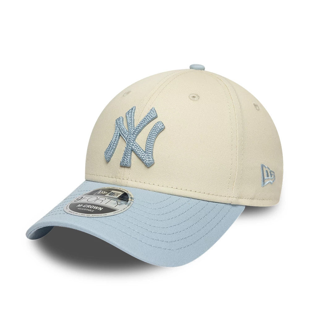 New York Yankees MLB Side Script Cream New Era 9FORTY M-Crown Adjustable Cap, front view showing a raised embroidered light blue NY logo on the cream front panel, a contrasting light blue curved visor, and a 9FORTY size sticker.