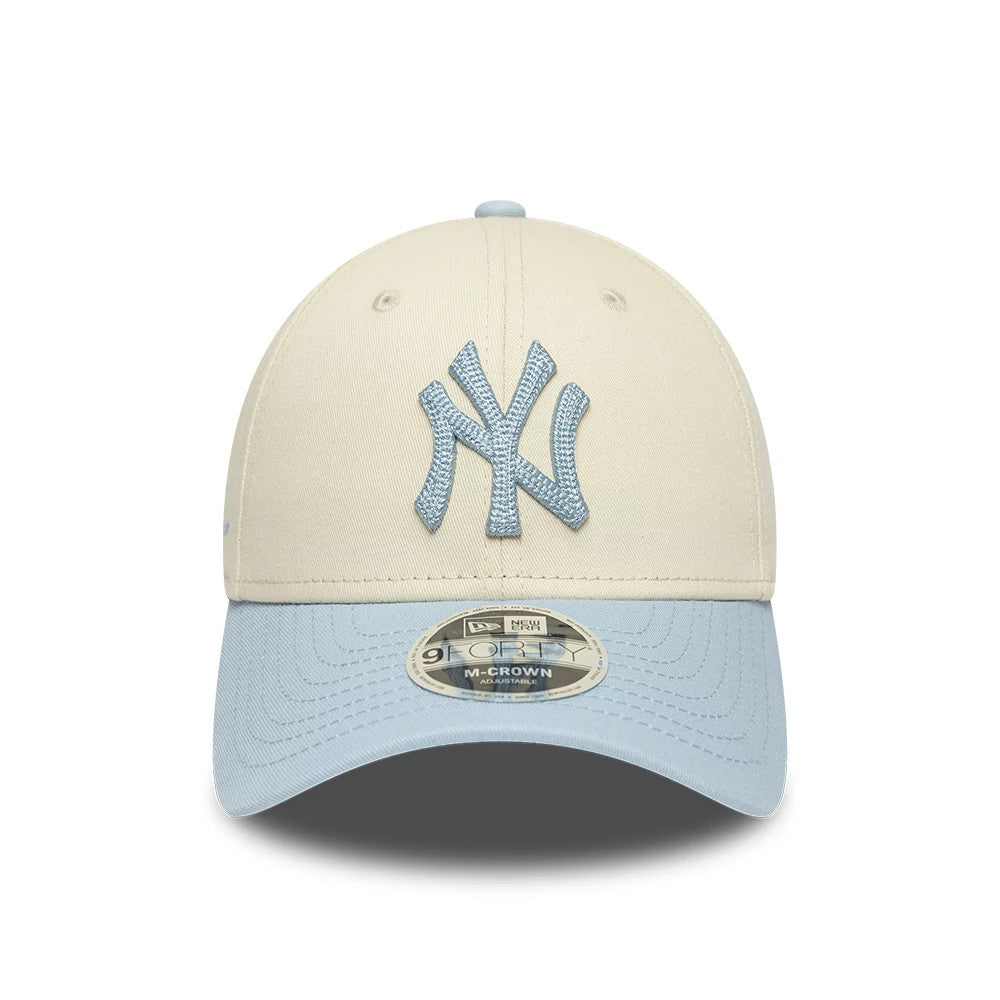 New York Yankees MLB Side Script Cream New Era 9FORTY M-Crown Adjustable Cap, front view showing the light blue embroidered NY logo on the cream front panel, with a matching light blue curved visor and a 9FORTY size sticker on the visor.