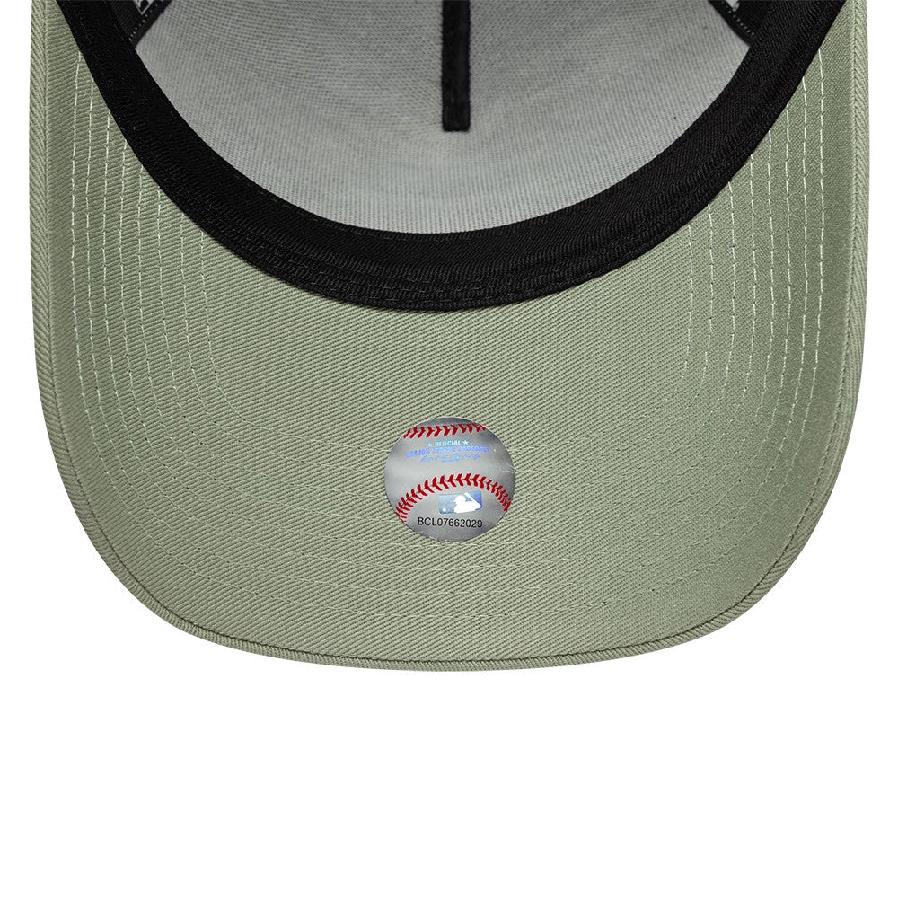 New York Yankees MLB League Essential Pastel Green New Era 9FORTY E-Frame Adjustable Cap, inside view showing the black sweatband, pastel green undervisor with a baseball sticker in the centre, and black internal taping.
