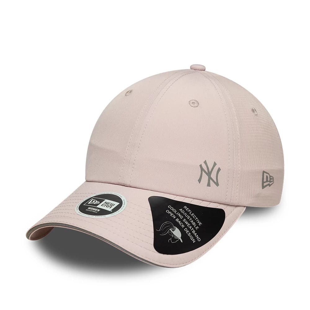 New Era New York Yankees Womens MLB Mesh Pastel Pink Pony Tail Cap, three-quarter view showing a raised grey embroidered NY logo on the front panel, curved pink visor with a 9FORTY size sticker, and New Era flag logo on the left side.