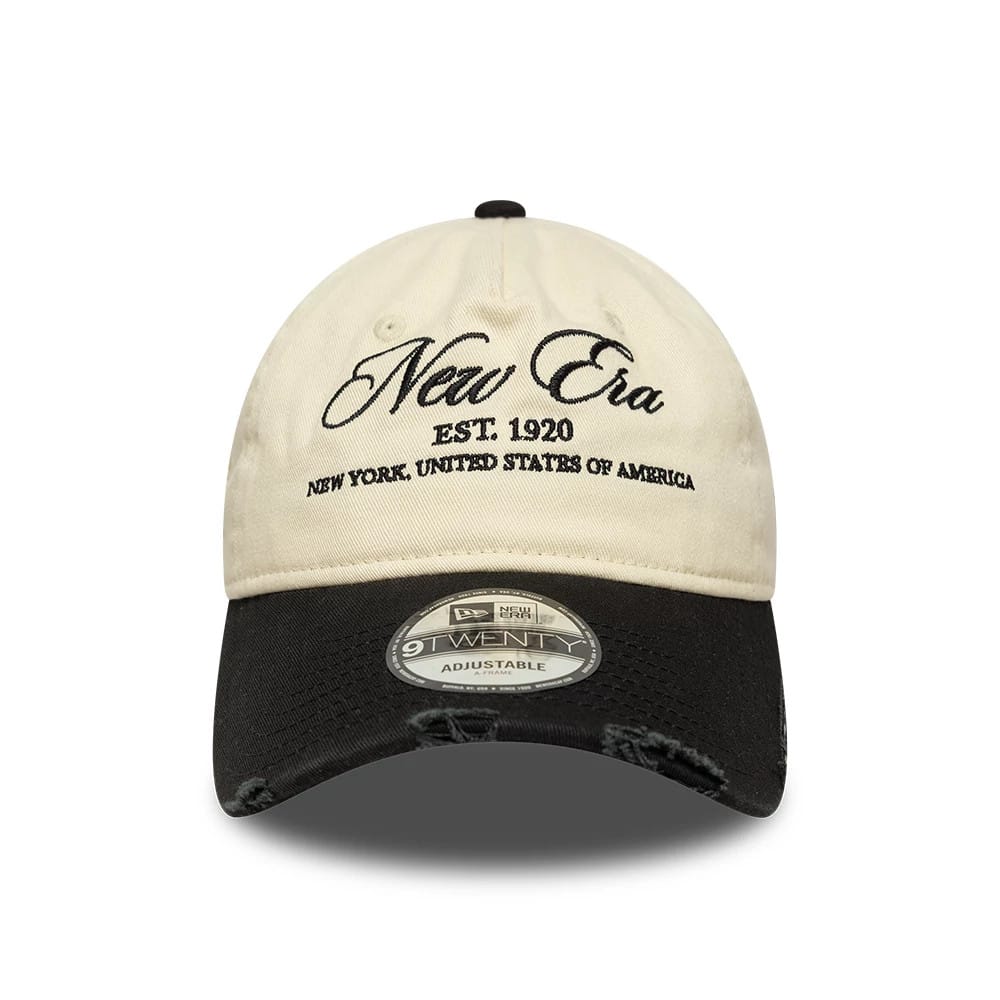 Pictured is this New Era Wash Distress 9TWENTY A-Frame cap in light beige. 2