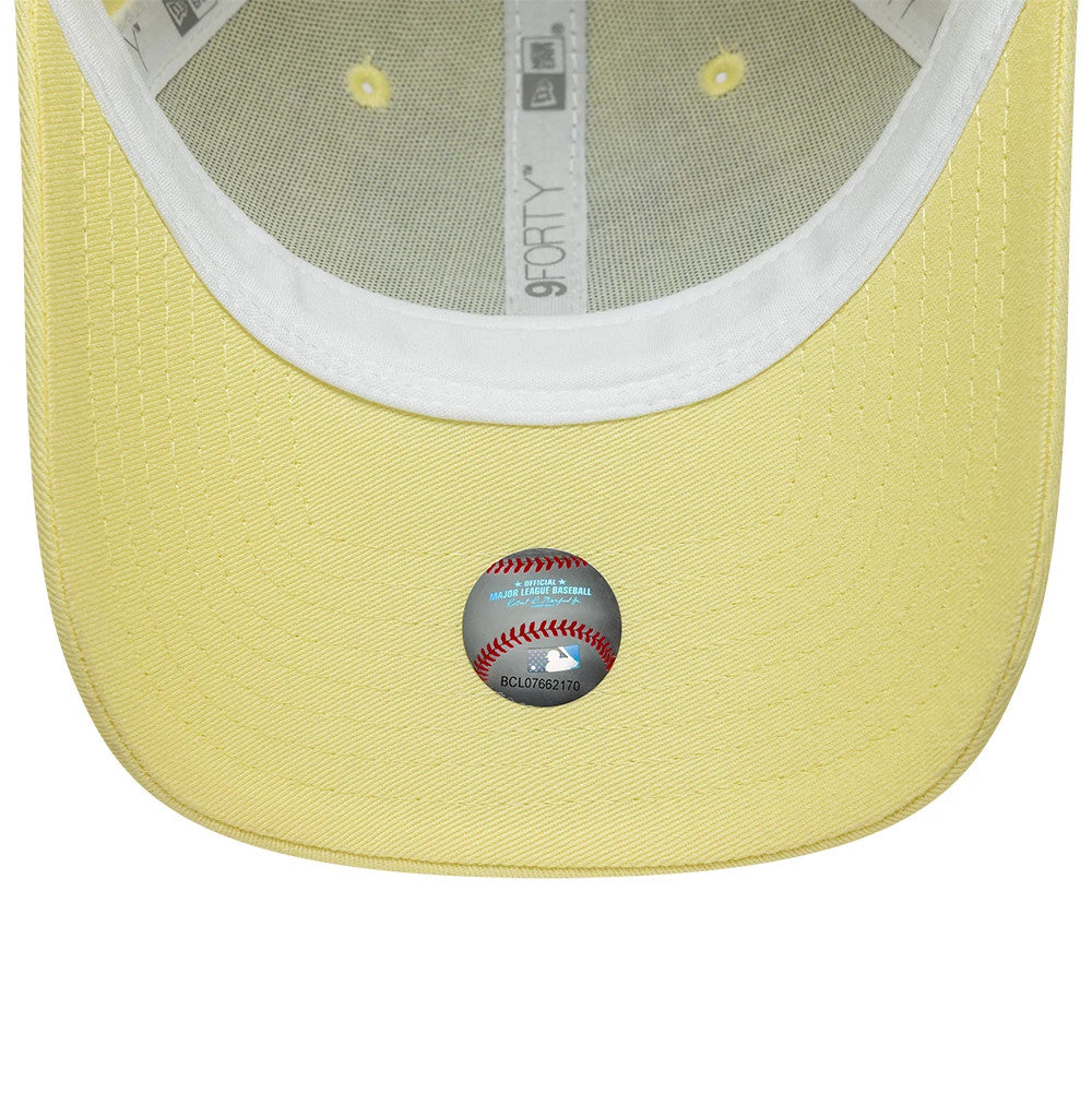 LA Dodgers MLB Team Outline Pastel Yellow New Era 9FORTY Adjustable Cap, inside view showing a white sweatband, grey taping with 9FORTY branding, and a pastel yellow undervisor with an MLB holographic sticker near the edge.