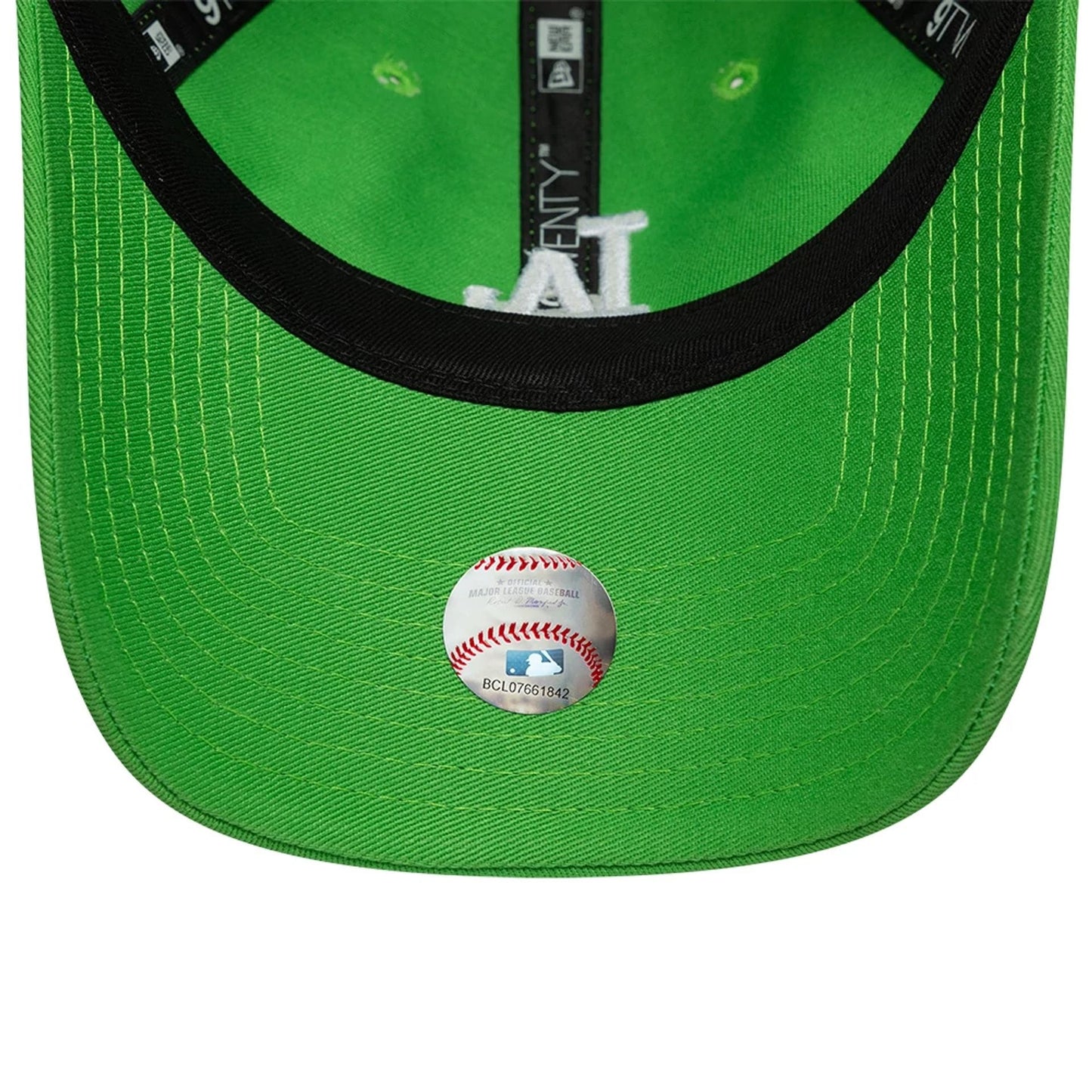 LA Dodgers Womens MLB League Essential Open Green New Era 9TWENTY Adjustable Cap, inside view revealing the bright green undervisor with a silver MLB sticker, black internal taping with '9TWENTY' text.
