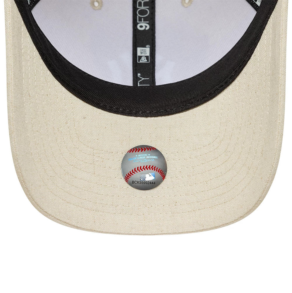 Pictured is this MLB Linen New York Yankees 9FORTY M-Crown cap in Cream. 5
