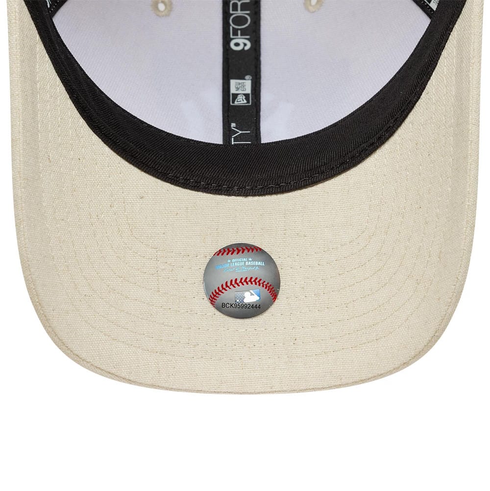 Pictured is this MLB Linen New York Yankees 9FORTY M-Crown cap in Cream. 5