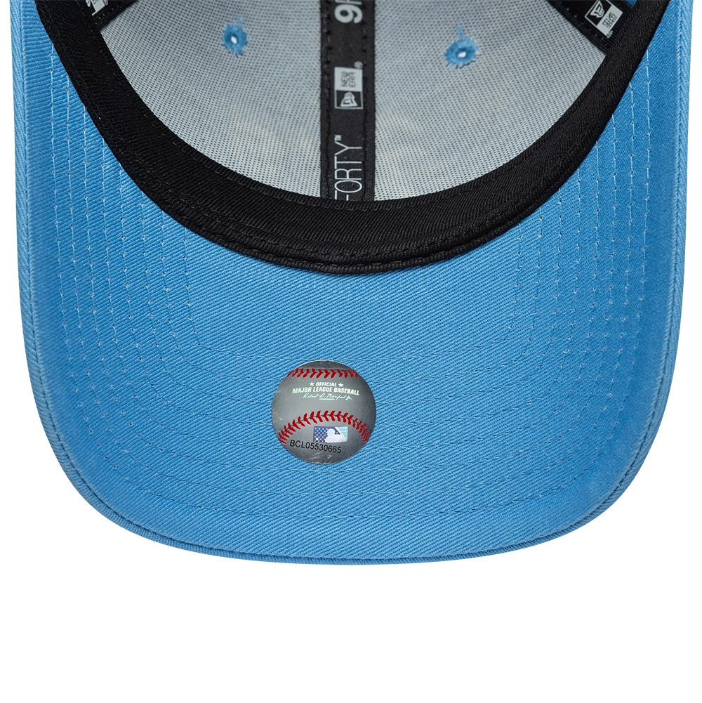 Athletics MLB League Essential Pastel Blue New Era 9FORTY Adjustable Cap, inside view showing the grey fabric undervisor, black sweatband, and branded taping, with a detailed 9FORTY size sticker on the pastel blue interior lining.