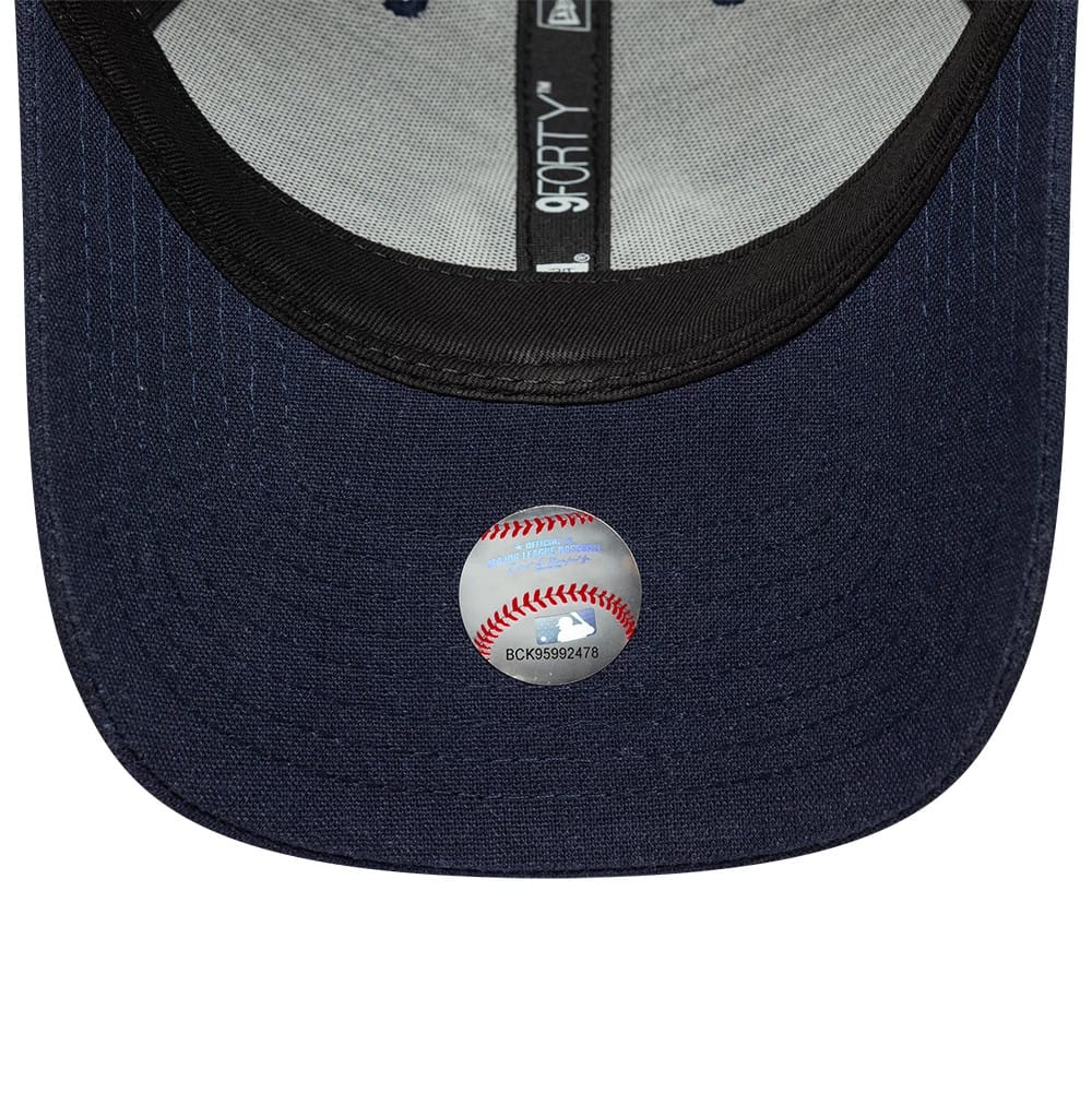 Pictured is this MLB Linen New York Yankees 9FORTY M-Crown cap in navy. 5