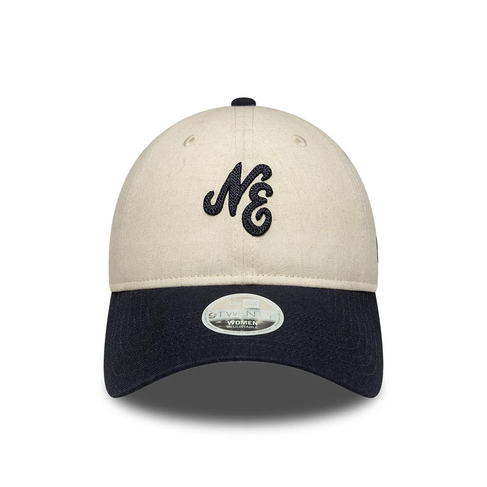 Womens New Era Linen Navy 9TWENTY Adjustable Cap, front view showing raised navy NE embroidery on the linen crown, navy curved visor, and 9TWENTY size sticker at the centre, with matching top button and eyelets.