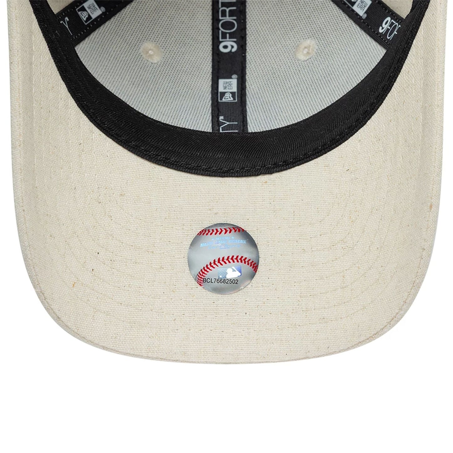 Pictured is this Youth MLB Linen New York Yankees 9FORTY M-Crown cap in Cream. 5