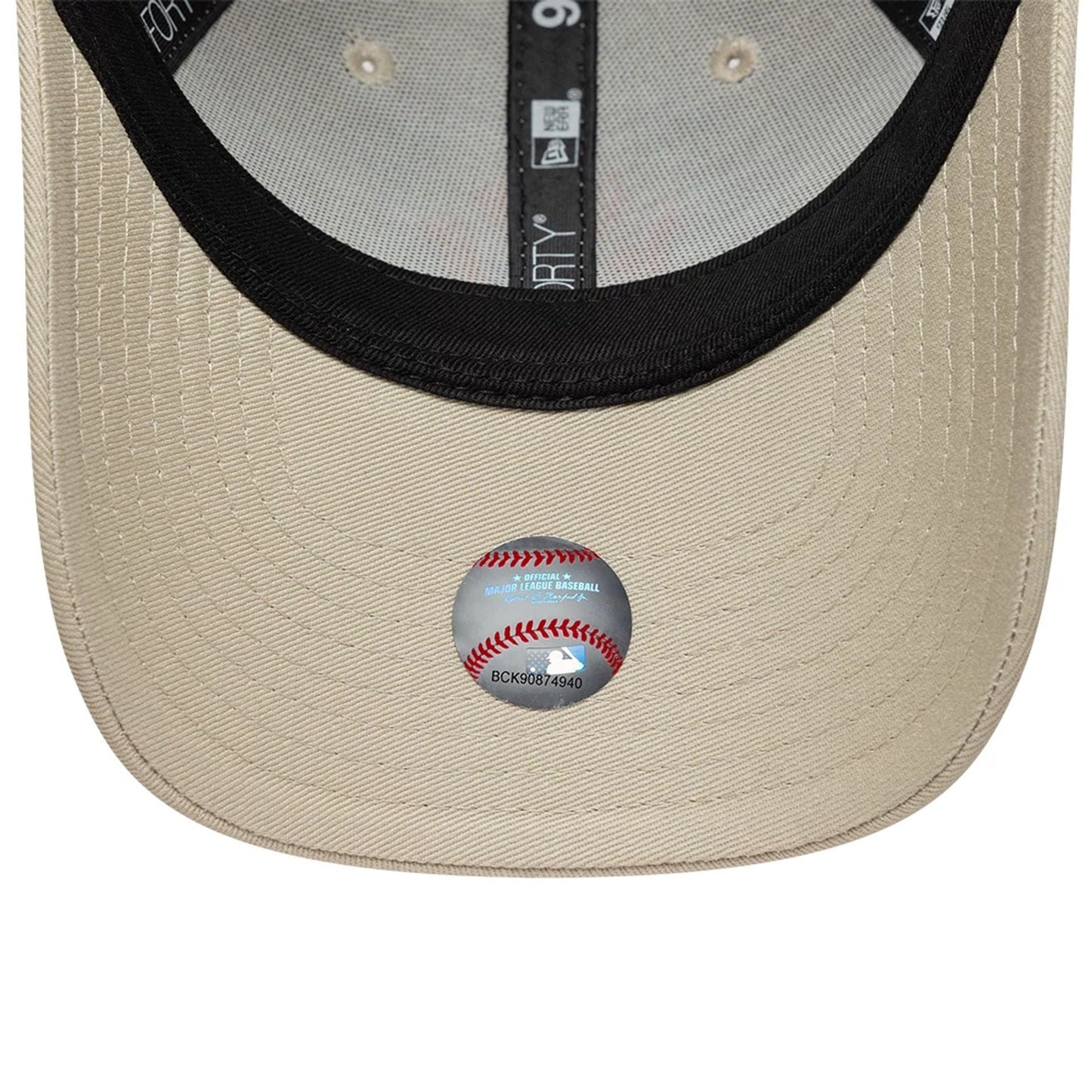 Pictured is this Youth MLB League Essential New York Yankees 9FORTY cap in light beige. 5