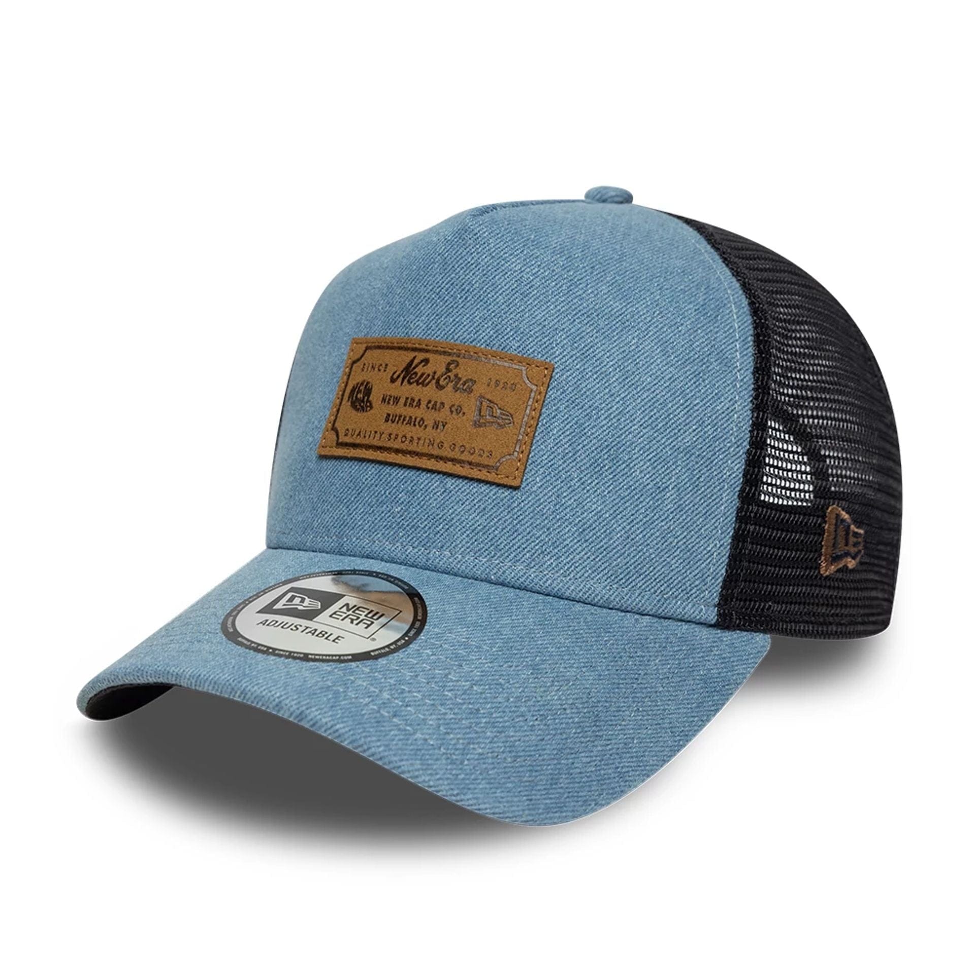Pictured is this New Era Leather Patch Denim 9FORTY A-Frame Trucker cap in navy. 1