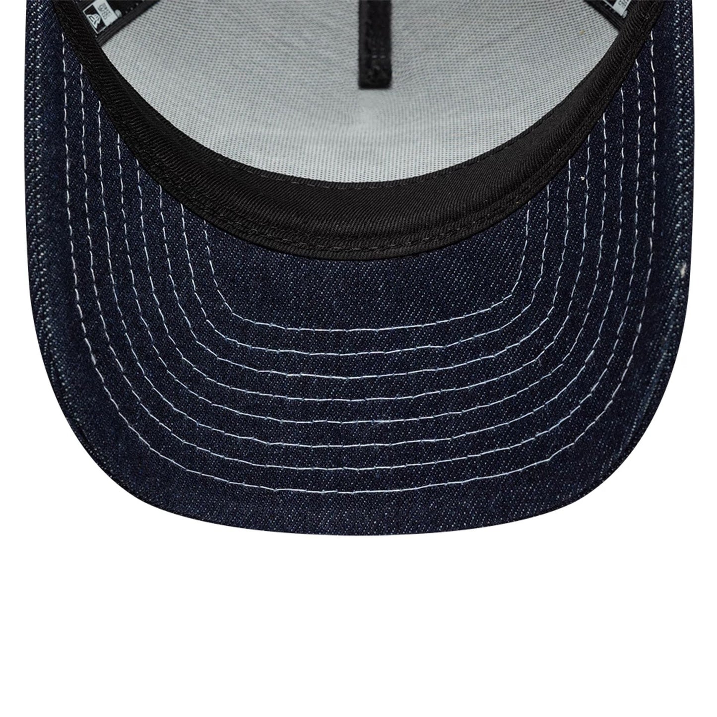 Pictured is this Womens New Era Denim 9FORTY M-Crown A-Frame Trucker cap in navy. 5