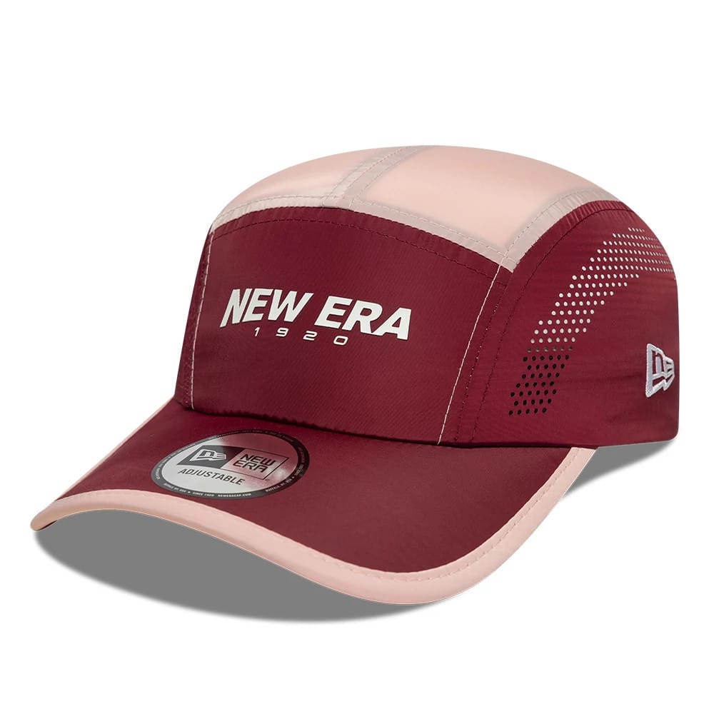 New Era Colour Block Dark Red Runner Adjustable Cap, three-quarter view showing the white New Era 1920 lettering on the front panel, contrasting pink stitching on the crown, and grey embroidered New Era flag logo on the left side.