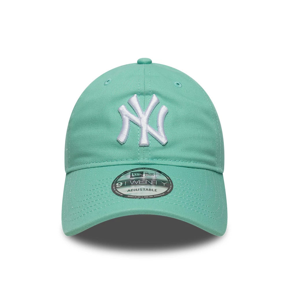 New York Yankees MLB League Essential Pastel Green New Era 9TWENTY Adjustable Cap, front view showing the white raised embroidered NY logo on the structured pastel green crown, with an eye-catching 9TWENTY size sticker on the curved visor.