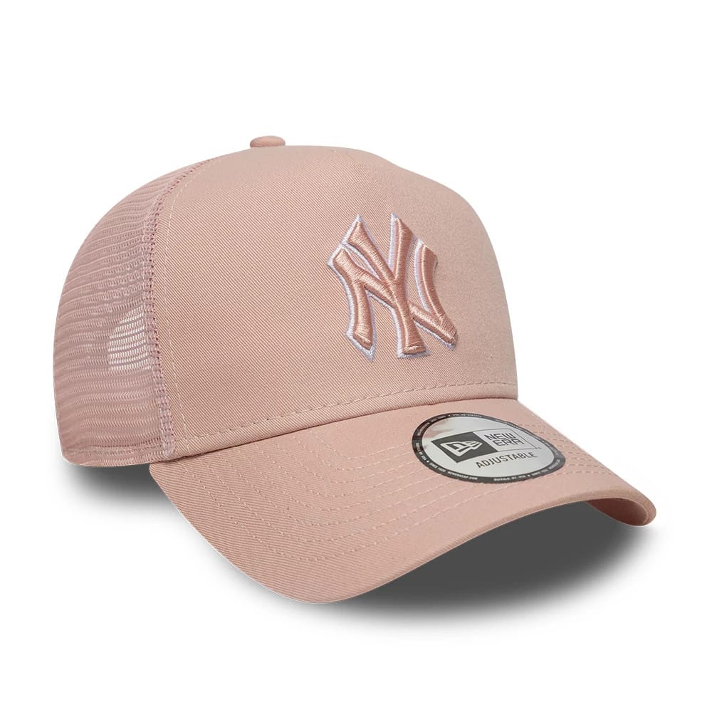 New York Yankees MLB Outline Pastel Pink New Era 9FORTY E-Frame Trucker Adjustable Cap, three-quarter view showing the raised embroidered white NY logo on the front panel, pastel pink curved visor with a 9FORTY size sticker, and mesh side panels.