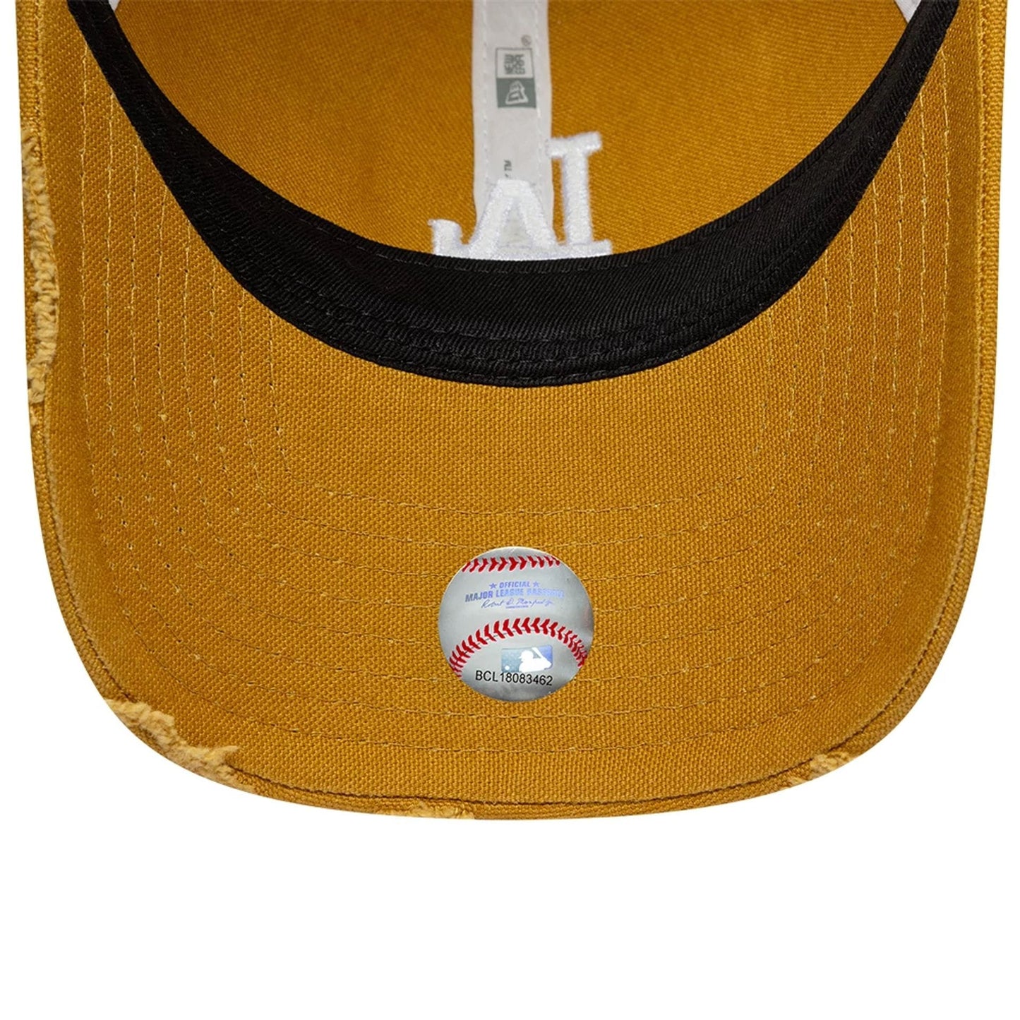 Pictured is this MLB Cotton Canvas LA Dodgers 9TWENTY Trucker cap in beige. 5