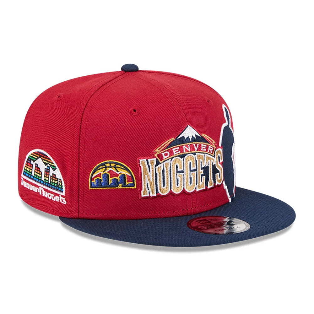 Nuggets NBA Hardwood Classic ASG Dark Red New Era 9FIFTY Snapback Adjustable Cap, front view showing the Denver Nuggets logo embroidered in white and gold on the red crown, with cityscape patches on the side and a navy flat visor.