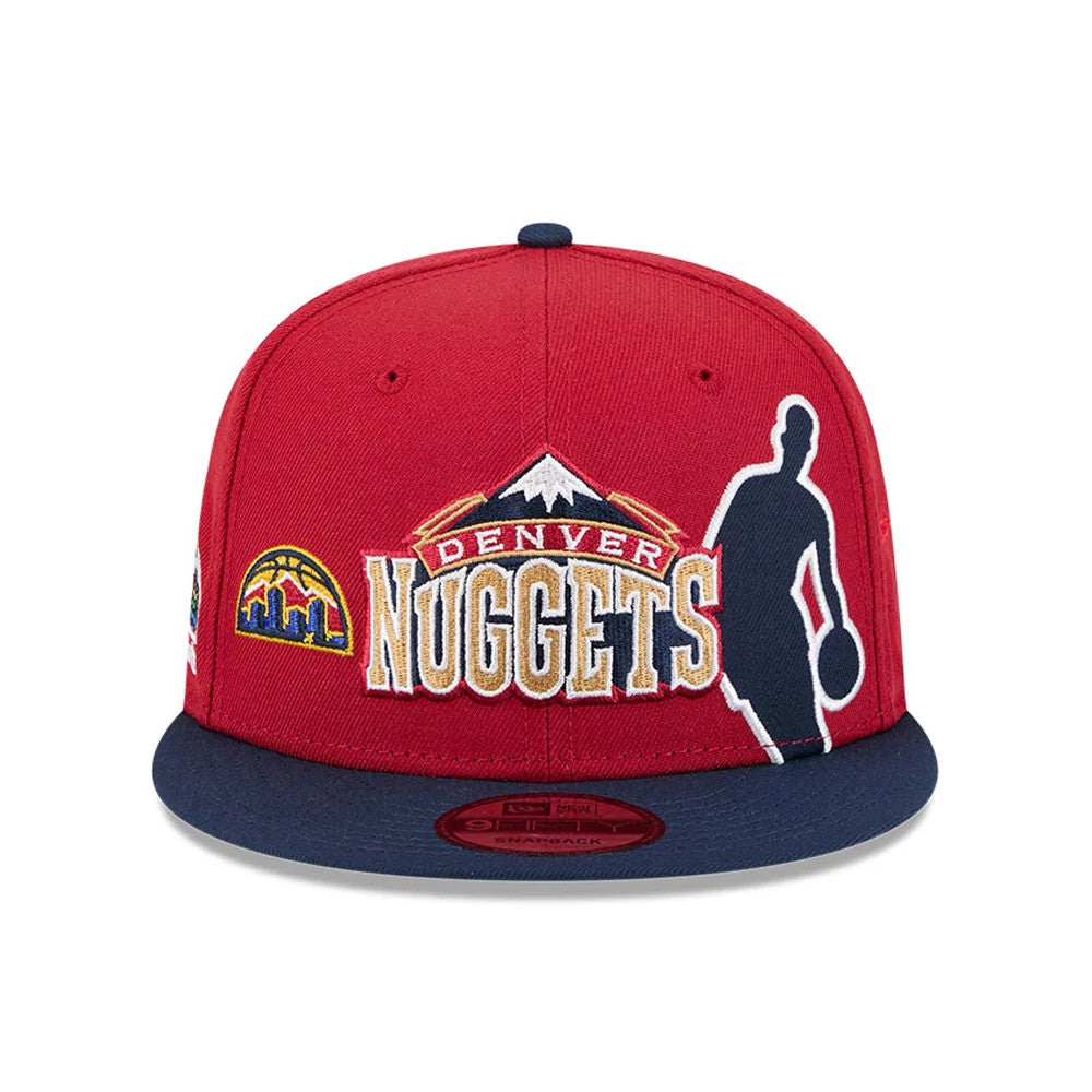 Nuggets NBA Hardwood Classic ASG Dark Red New Era 9FIFTY Snapback Adjustable Cap, front view showing the multicoloured embroidered Denver Nuggets mountain logo on red panels, with a navy flat visor and dark red 9FIFTY size sticker on top.