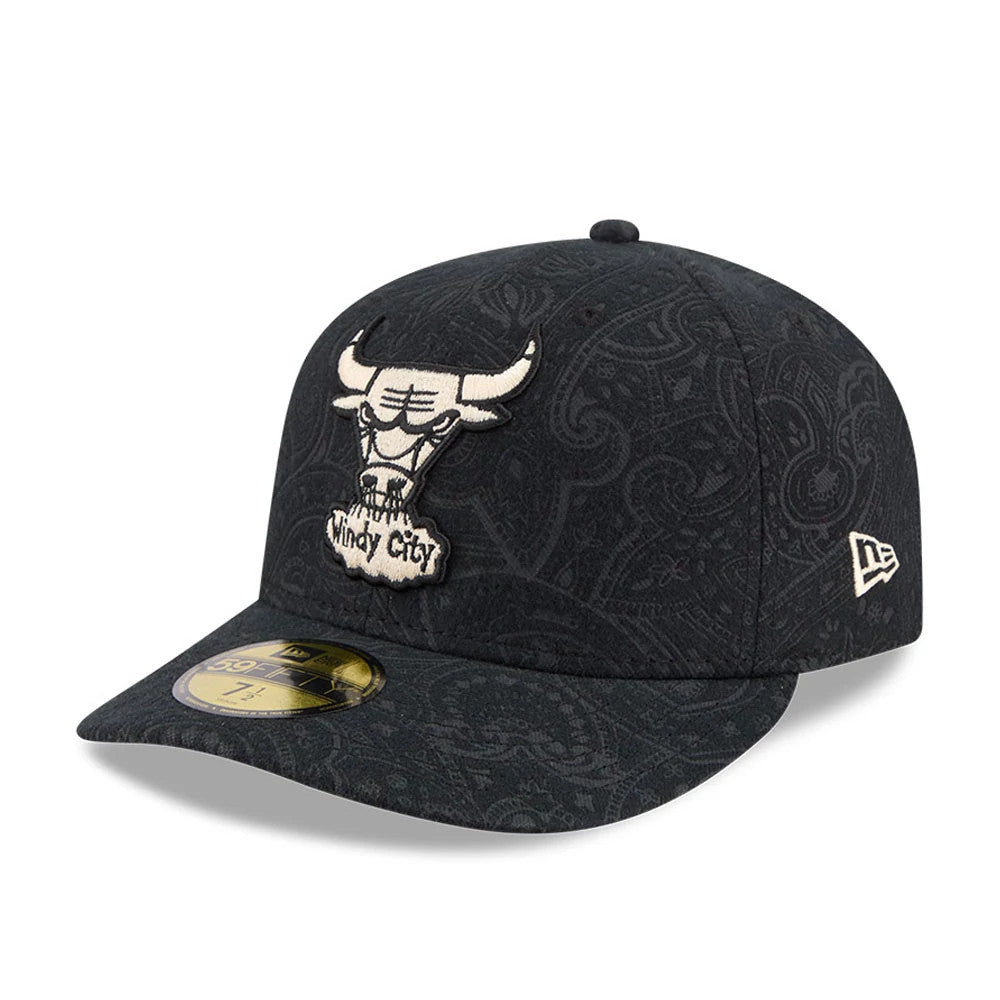 Chicago Bulls NBA Brushed Cotton Black New Era 59FIFTY Fitted Cap, three-quarter view showing the raised white embroidered Bulls logo on the front panel, detailed paisley pattern on the black fabric, and gold 59FIFTY size sticker on the flat visor.
