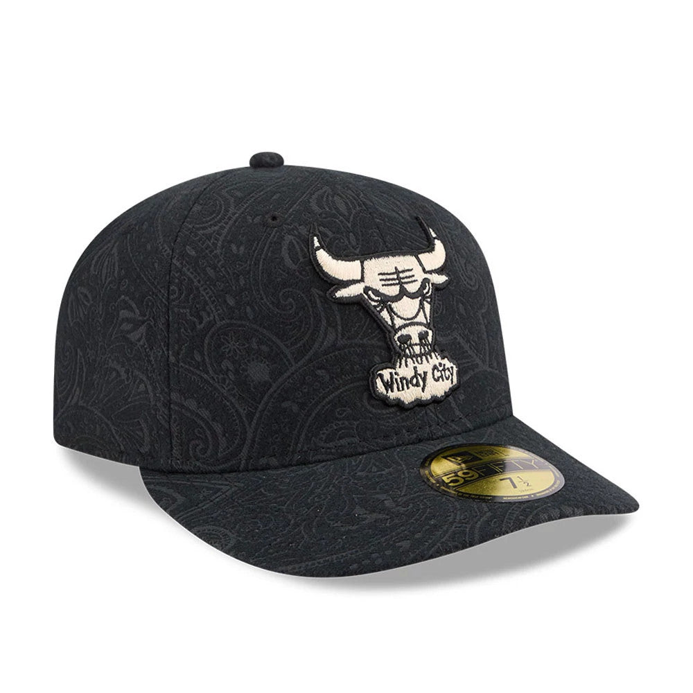 Chicago Bulls NBA Brushed Cotton Black New Era 59FIFTY Fitted Cap, three-quarter view showing the large white embroidered Bulls logo with Windy City text on the structured crown, the paisley pattern.