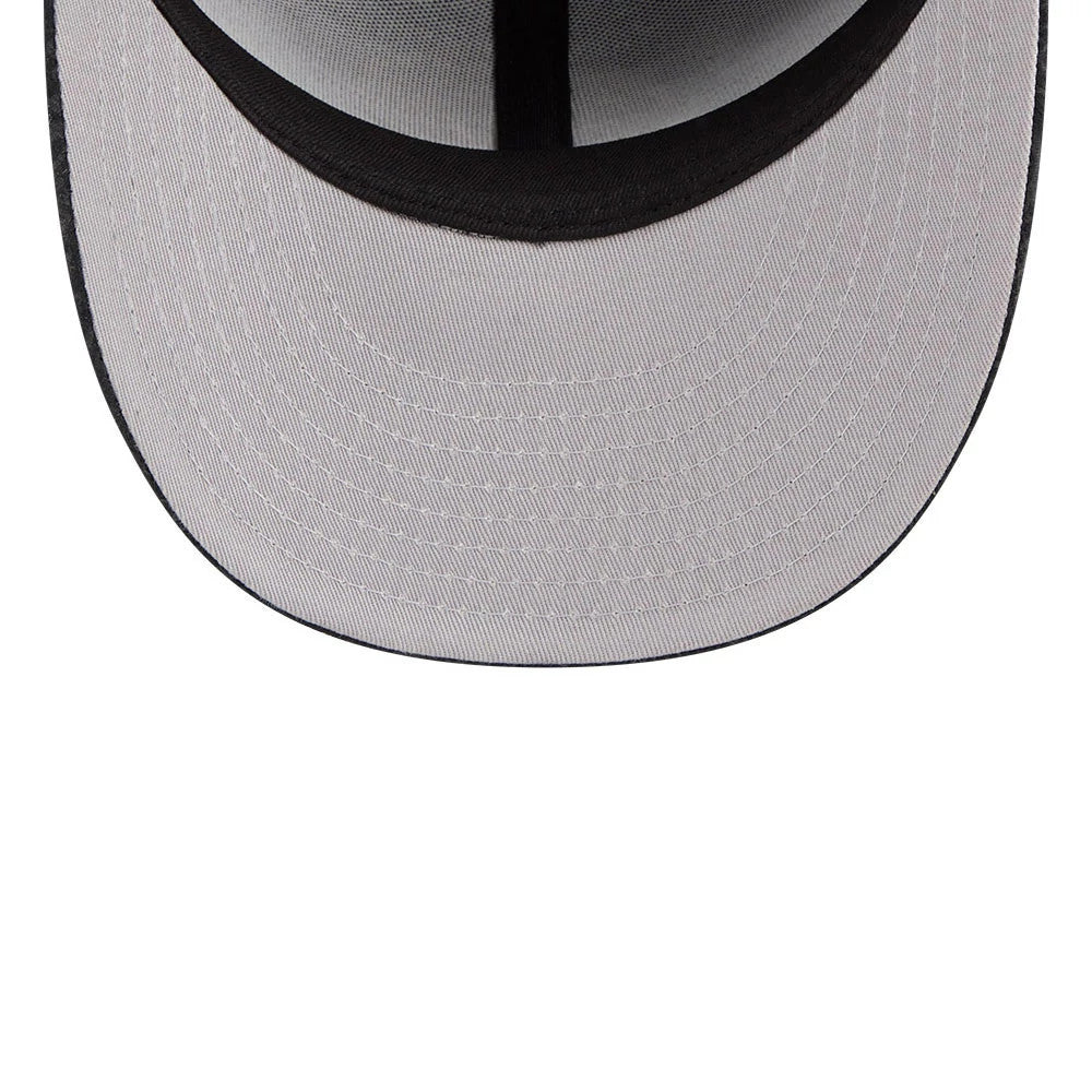 Chicago Bulls NBA Brushed Cotton Black New Era 59FIFTY Fitted Cap, inside view showing the grey undervisor with black edge stitching, taping on the interior seam, and the black internal sweatband along the cap's base.