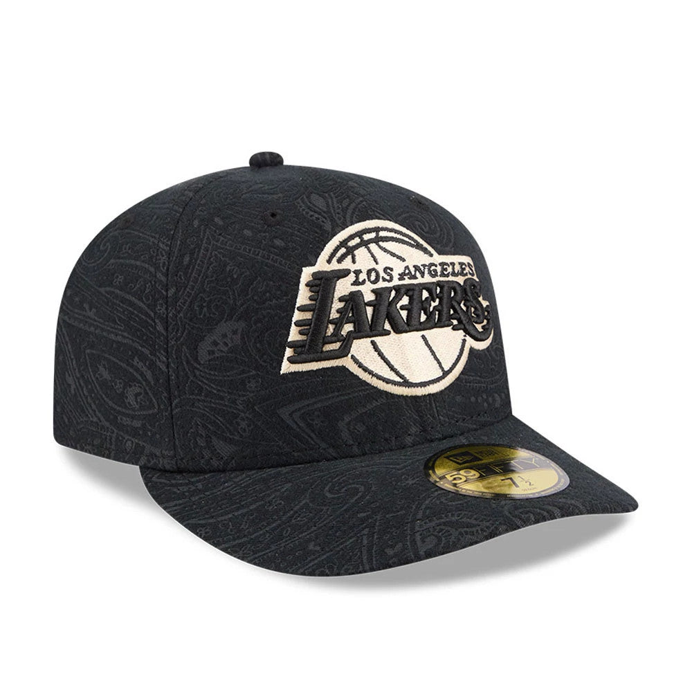 LA Lakers NBA Brushed Cotton Black New Era 59FIFTY Fitted Cap, three-quarter view showing the white and black embroidered Lakers logo on the front panel, paisley pattern across the black fabric, and gold 59FIFTY size sticker on the visor.