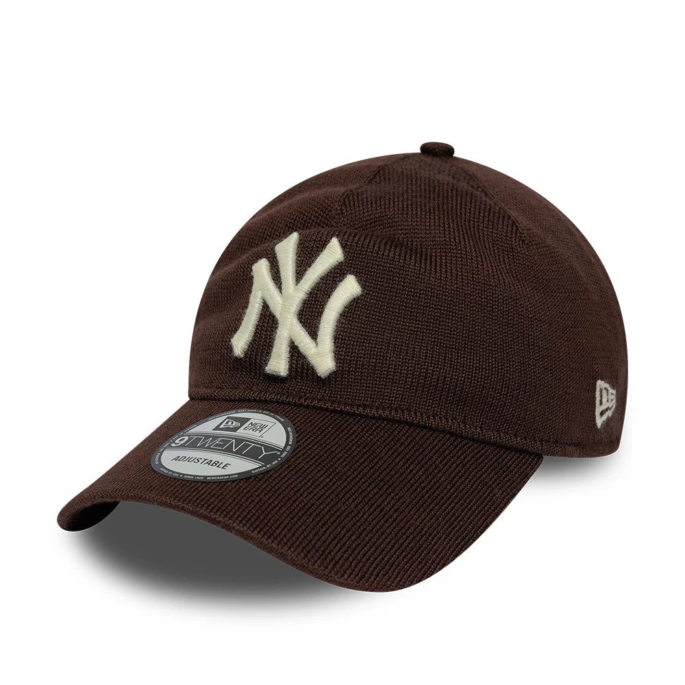 New York Yankees MLB Merino Wool Dark Brown New Era 9TWENTY Adjustable Cap, three-quarter view showing the cream NY logo in raised embroidery on the front panel, a curved visor with the 9TWENTY size sticker.