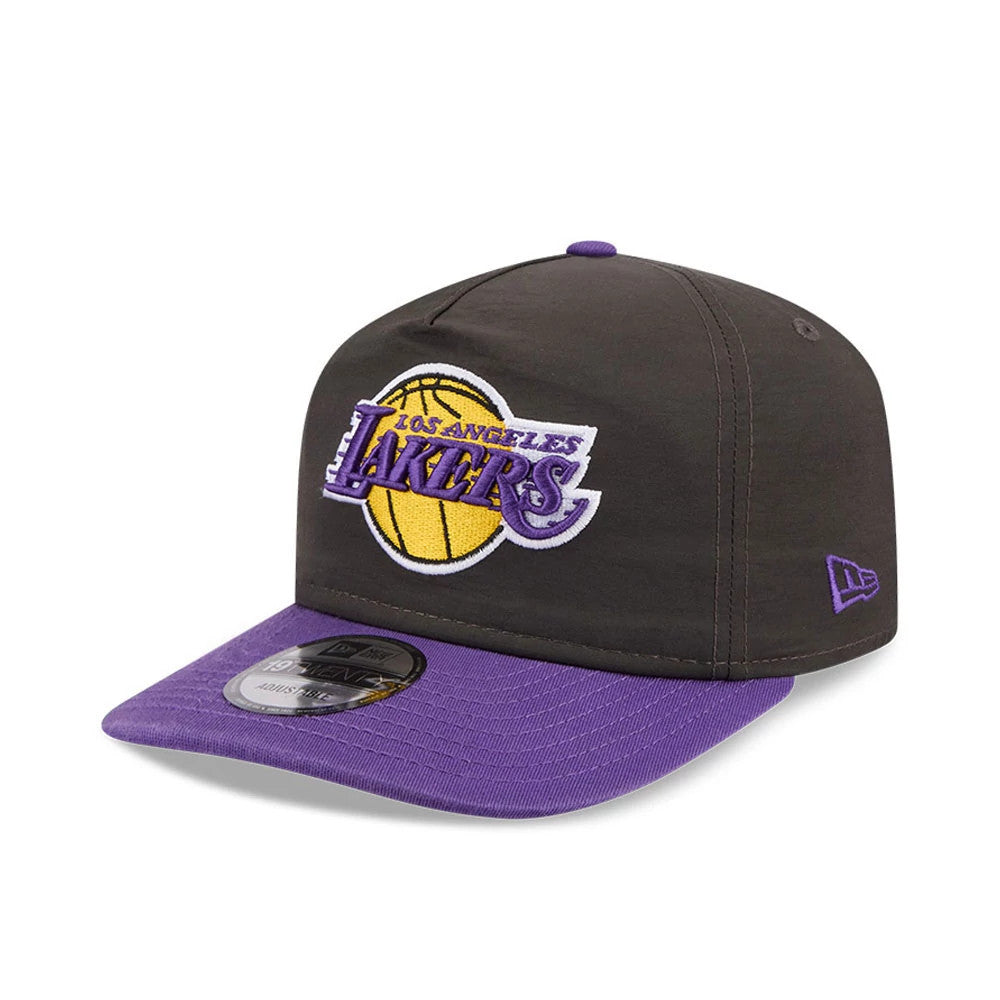 LA Lakers NBA Nylon Black New Era 19TWENTY Adjustable Cap, front view showing the purple and gold embroidered LA Lakers logo on the structured black crown, with a purple visor and 19TWENTY size sticker on the visor.