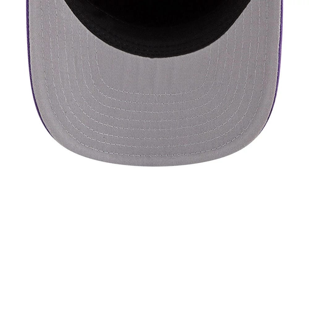 LA Lakers NBA Nylon Black New Era 19TWENTY Adjustable Cap, inside view showing the grey undervisor with detailed stitching, a black interior sweatband circling the crown, and purple edging along the sides of the visor.