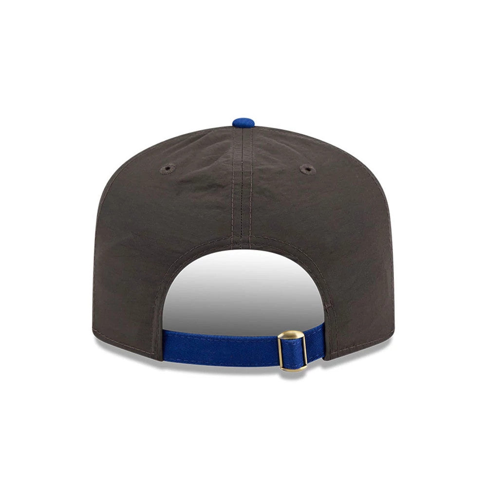 New York Mets MLB Nylon Black New Era 19TWENTY Adjustable Cap, rear view showing the adjustable blue fabric strap with a brass buckle, the black nylon crown with two eyelets, and a blue top button for contrast.