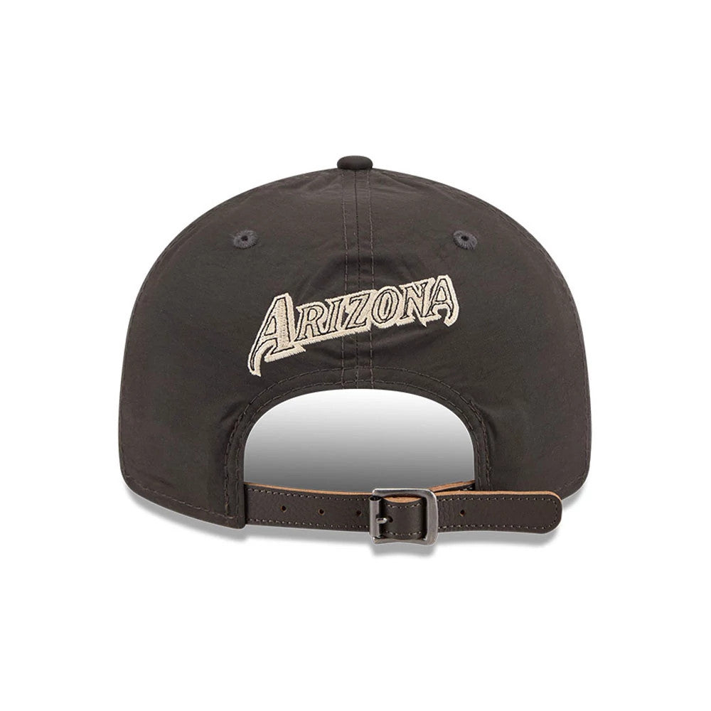 Arizona Diamondbacks MLB Nylon Black Retro Crown New Era 9FIFTY Adjustable Cap, rear view showing cream embroidered 'Arizona' text across the back panels, black eyelets, and a black leather adjustable strap with a silver buckle.