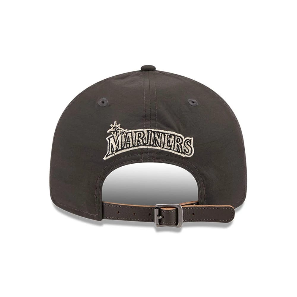 Seattle Mariners MLB Nylon Black Retro Crown New Era 9FIFTY Adjustable Cap, rear view showing the off-white embroidered Mariners logo on the soft black crown, with an adjustable brown leather strap and buckle closure.