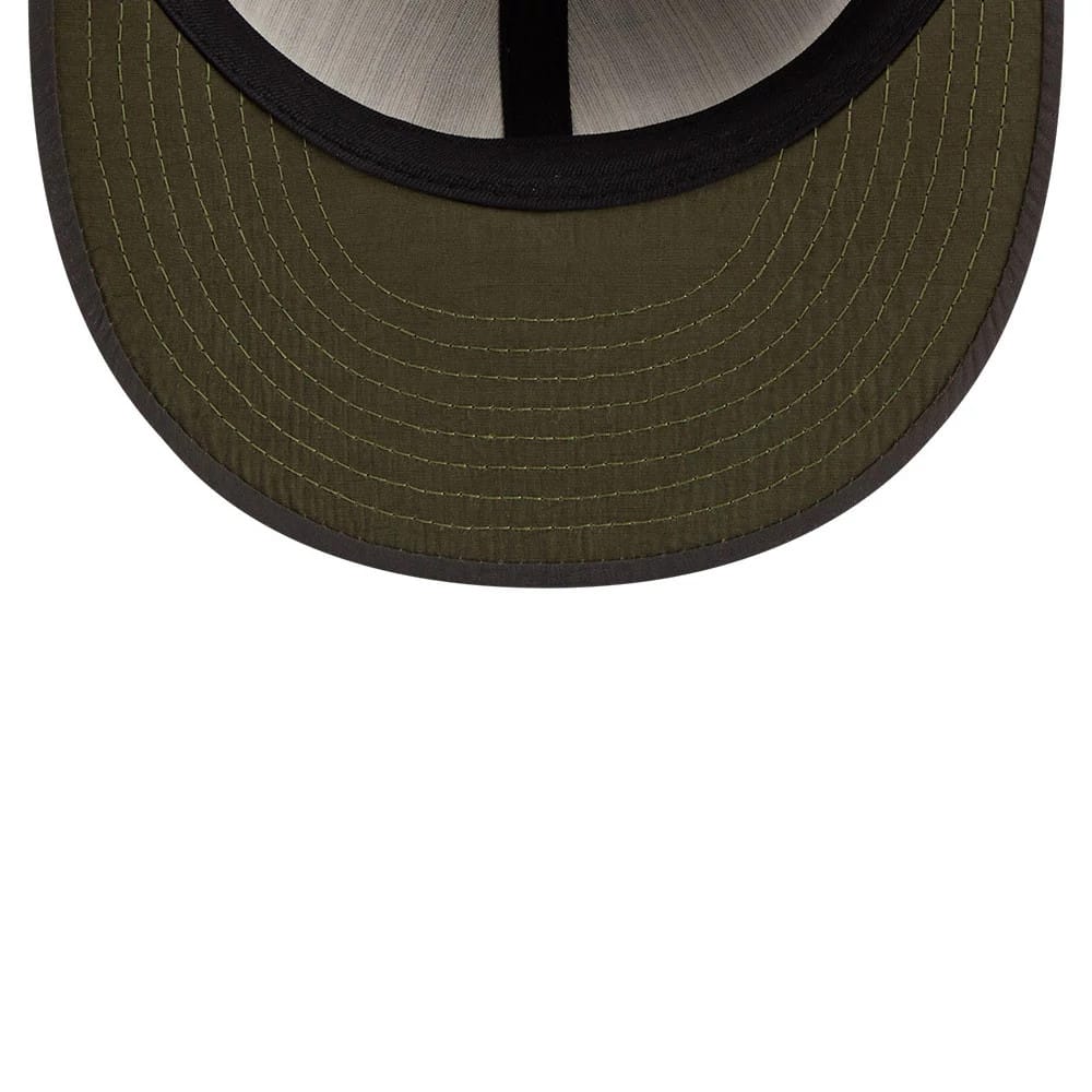 New York Mets MLB Nylon Black Retro Crown New Era 9FIFTY Adjustable Cap, inside view showing an olive green undervisor, with thick black taping along the seams and contrasting stitching that adds detail to the underside of the visor.