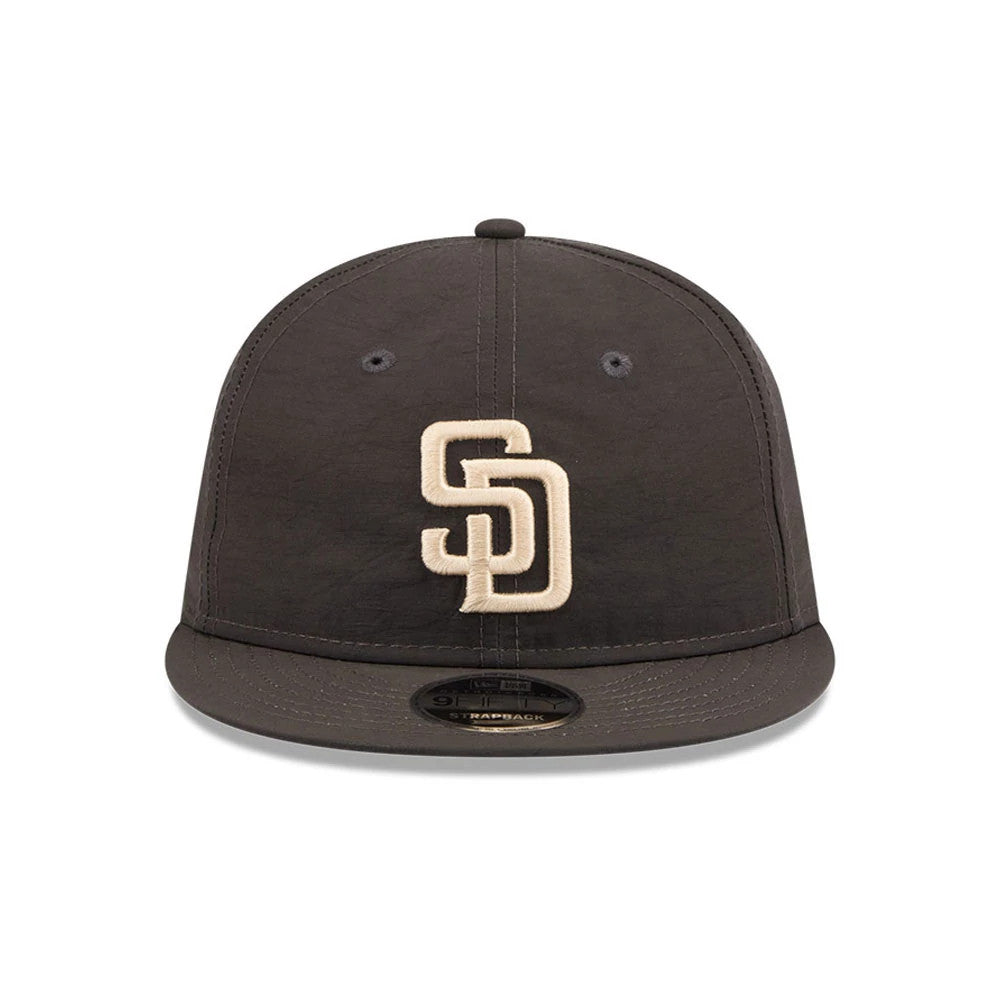 San Diego Padres MLB Nylon Black Retro Crown New Era 9FIFTY Adjustable Cap, front view showing raised beige embroidered SD logo on the structured black crown, with a flat visor and black 9FIFTY size sticker on the visor.