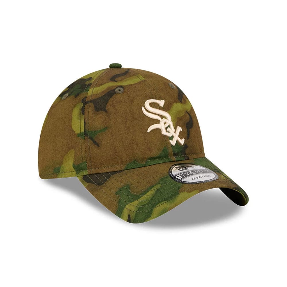 Chicago White Sox MLB Ripstop Camo New Era 9TWENTY Adjustable Cap, three-quarter view showing beige embroidered White Sox logo on front panel, camouflage-patterned visor with a 9TWENTY size sticker, and eyelets on the structured crown.