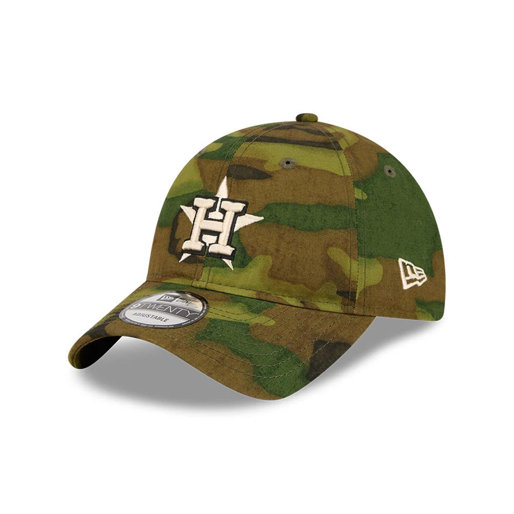 Houston Astros MLB Ripstop Camo New Era 9TWENTY Adjustable Cap, front view showing the white embroidered Astros logo on the structured camouflage crown, a New Era flag logo on the left side, and a 9TWENTY size sticker on the camo curved visor.