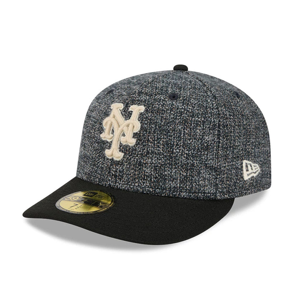 New York Mets MLB Tweedy Cotton Black New Era 59FIFTY Fitted Cap, three-quarter view showing a cream NY logo in raised embroidery on the marled tweed crown, with a solid black flat visor and gold 59FIFTY size sticker.