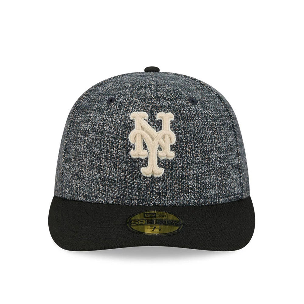 New York Mets MLB Tweedy Cotton Black New Era 59FIFTY Fitted Cap, front view showing an off-white embroidered Mets logo on the textured tweedy cotton crown, with a black flat visor and a gold 59FIFTY size sticker centrally placed.